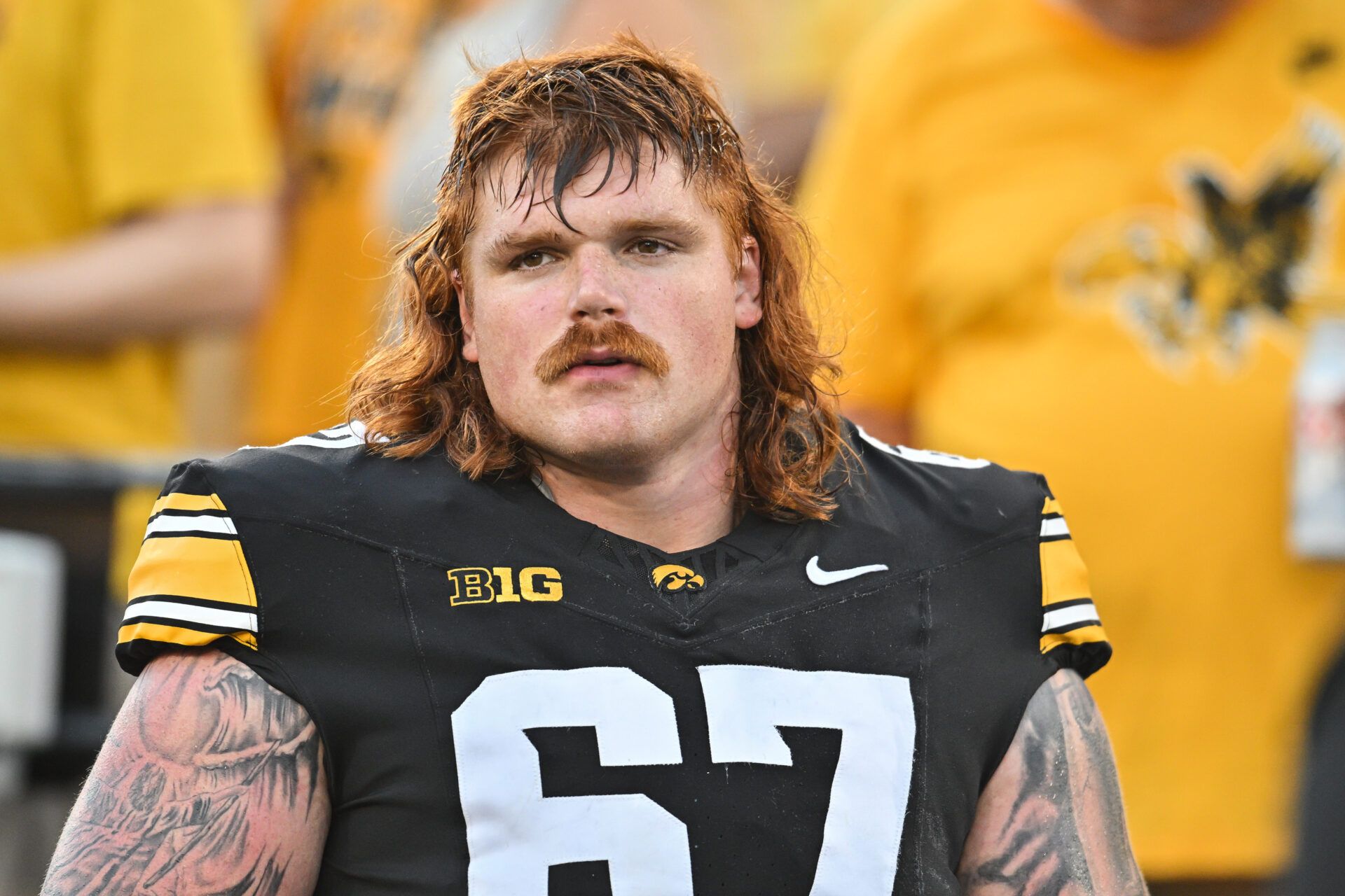Iowa Hawkeyes offensive lineman Gennings Dunker (67) looks on before the game against the Massachusetts Minutemen at Kinnick Stadium.
