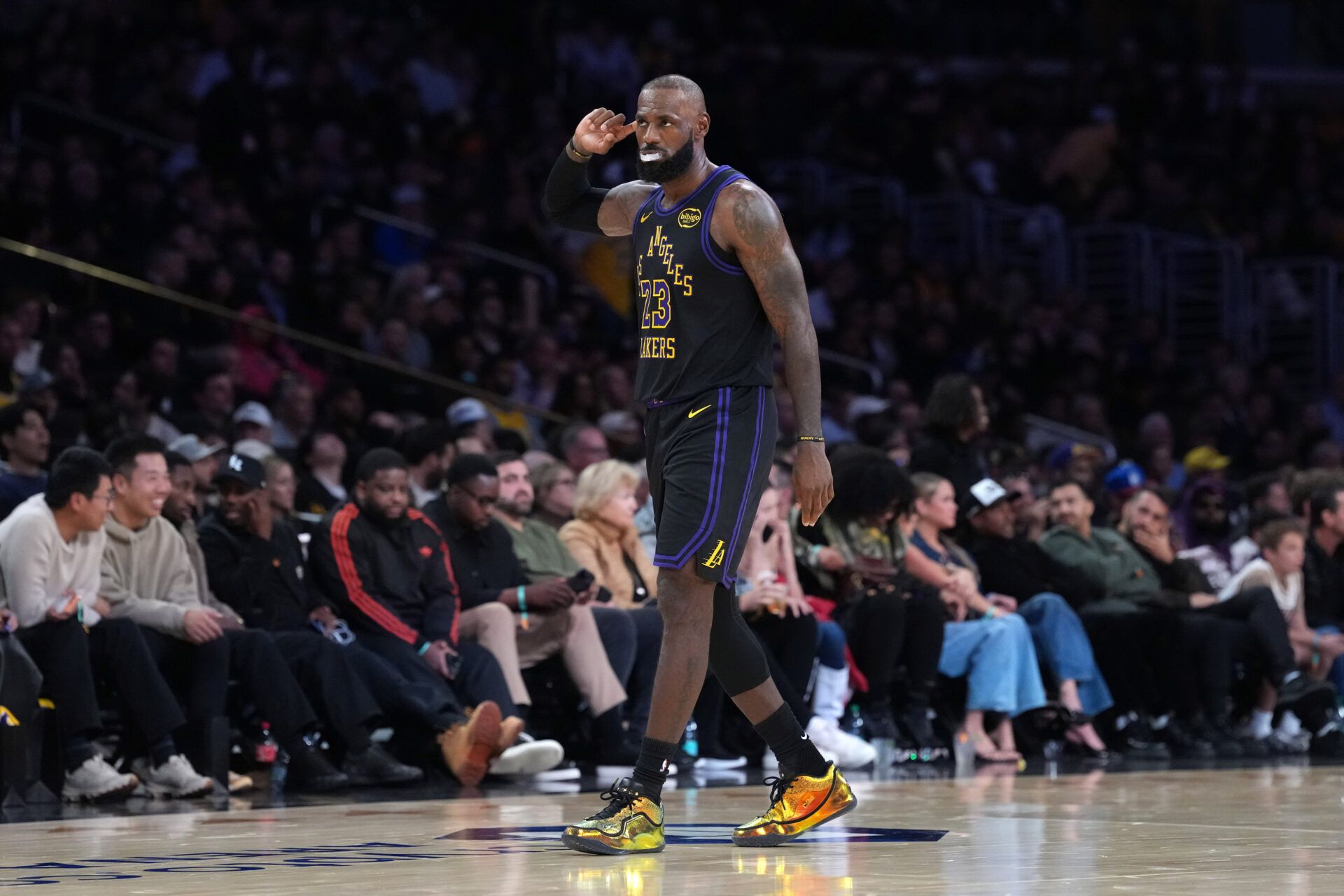 Los Angeles Lakers forward LeBron James (23) reacts against the Utah Jazz in the fourth quarter at Crypto.com Arena.
