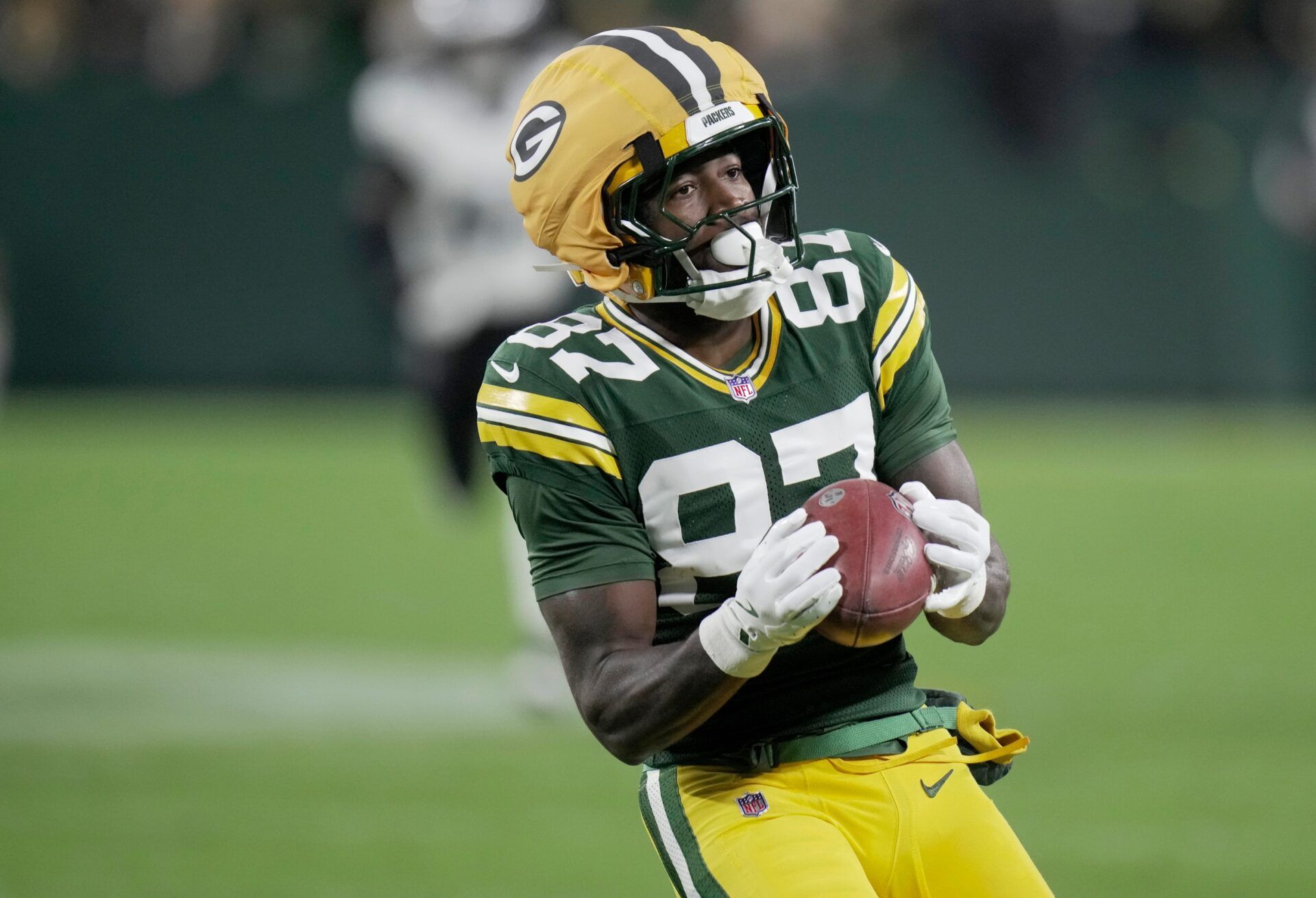 Green Bay Packers wide receiver Romeo Doubs (87) fields a punt during the second quarter of their game against the Philadelphia Eagles Monday, November 10, 2025 at Lambeau Field in Green Bay, Wisconsin.