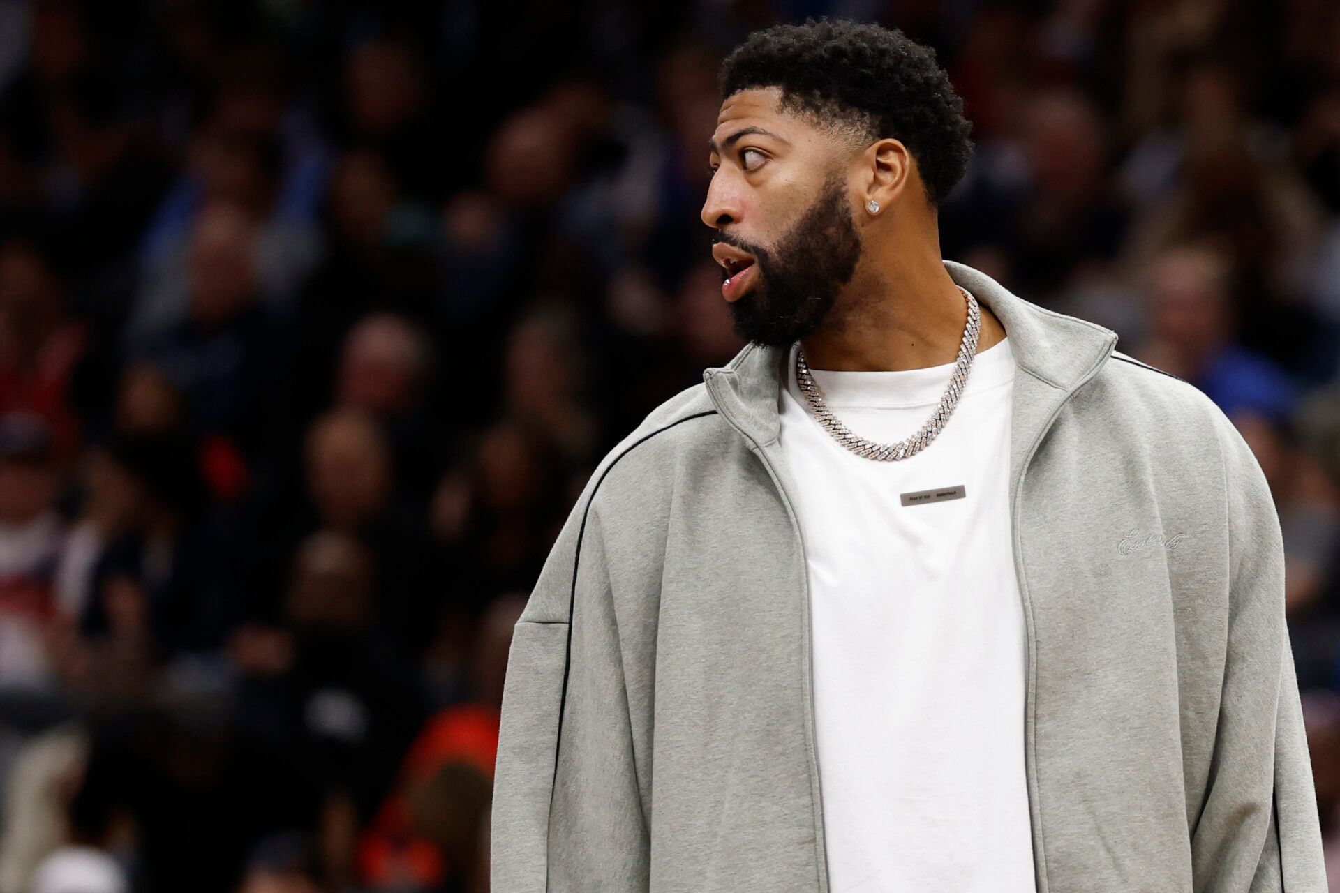Injured Dallas Mavericks forward Anthony Davis looks on from the bench during a timeout against the Washington Wizards in the second half at Capital One Arena.