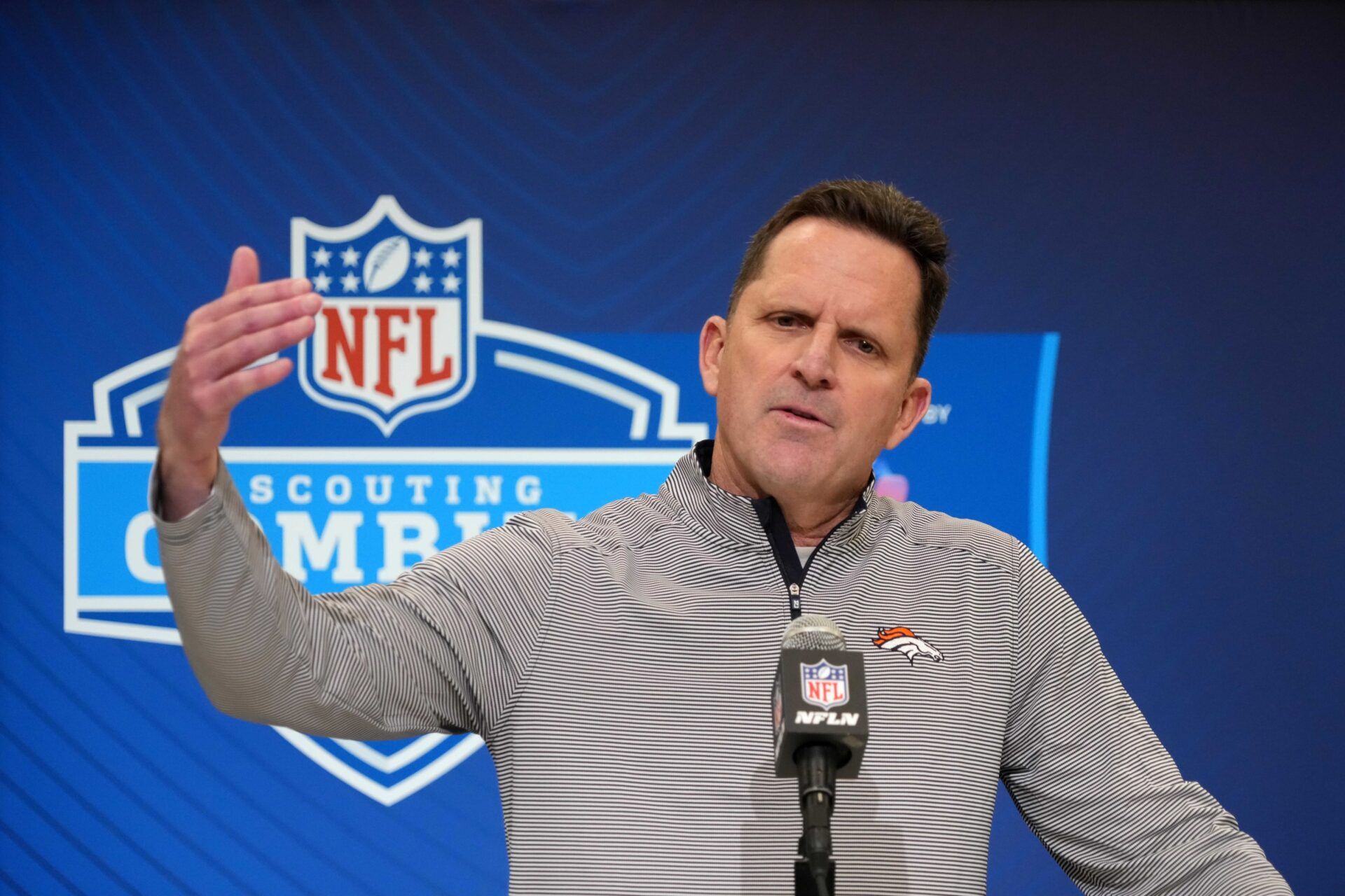 Denver Broncos general manager George Paton speaks during the NFL Scouting Combine at the Indiana Convention Center.