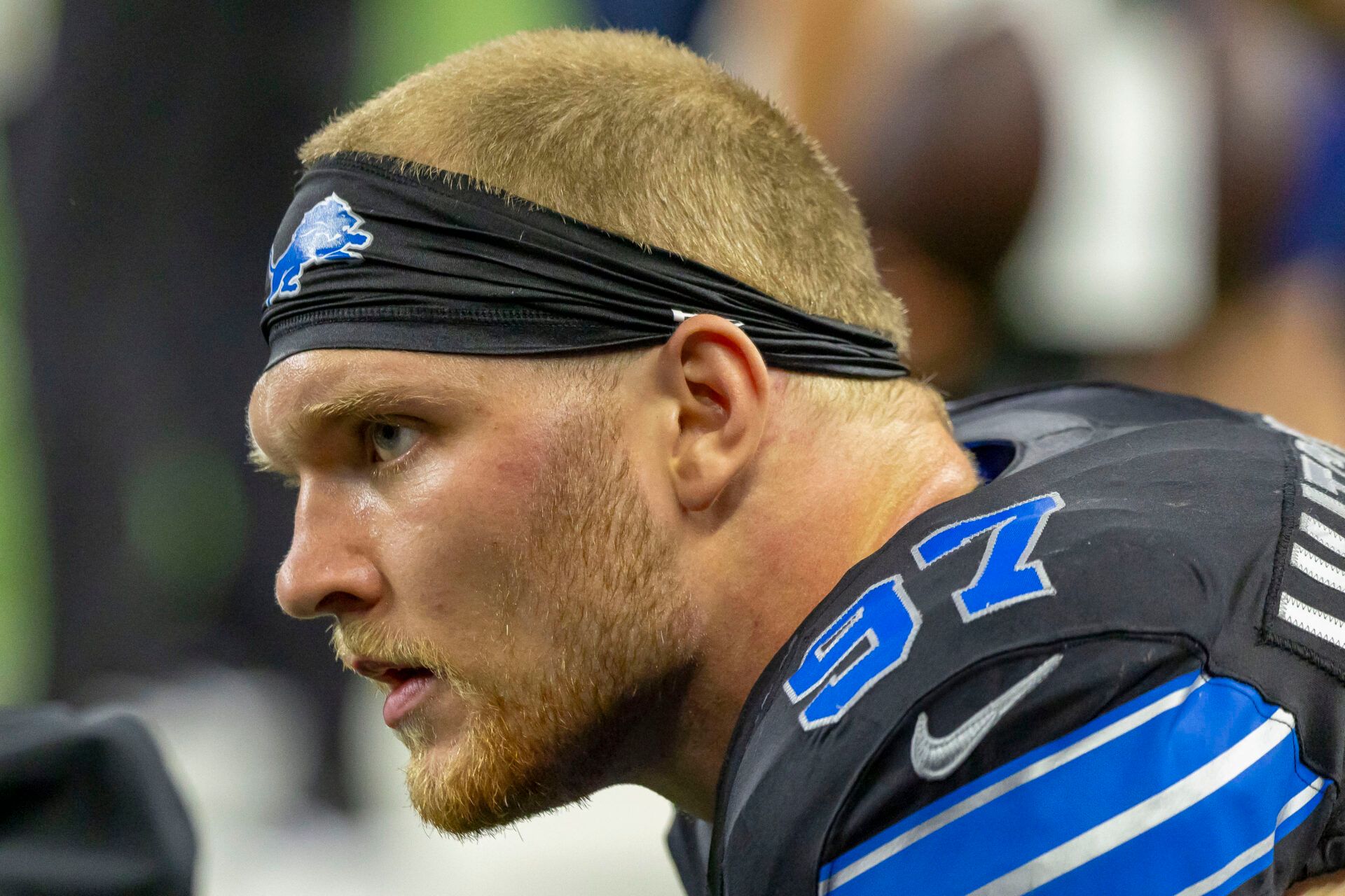 Detroit Lions defensive end Aidan Hutchinson (97) sits on the bench against the Tampa Bay Buccaneers during the second half at Ford Field.