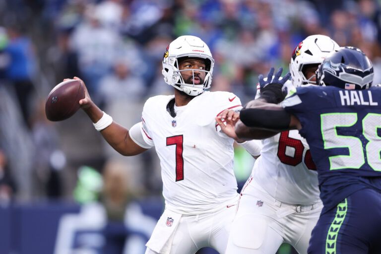 Arizona Cardinals quarterback Jacoby Brissett (7) throws a pass during the fourth quarter against the Seattle Seahawks at Lumen Field.