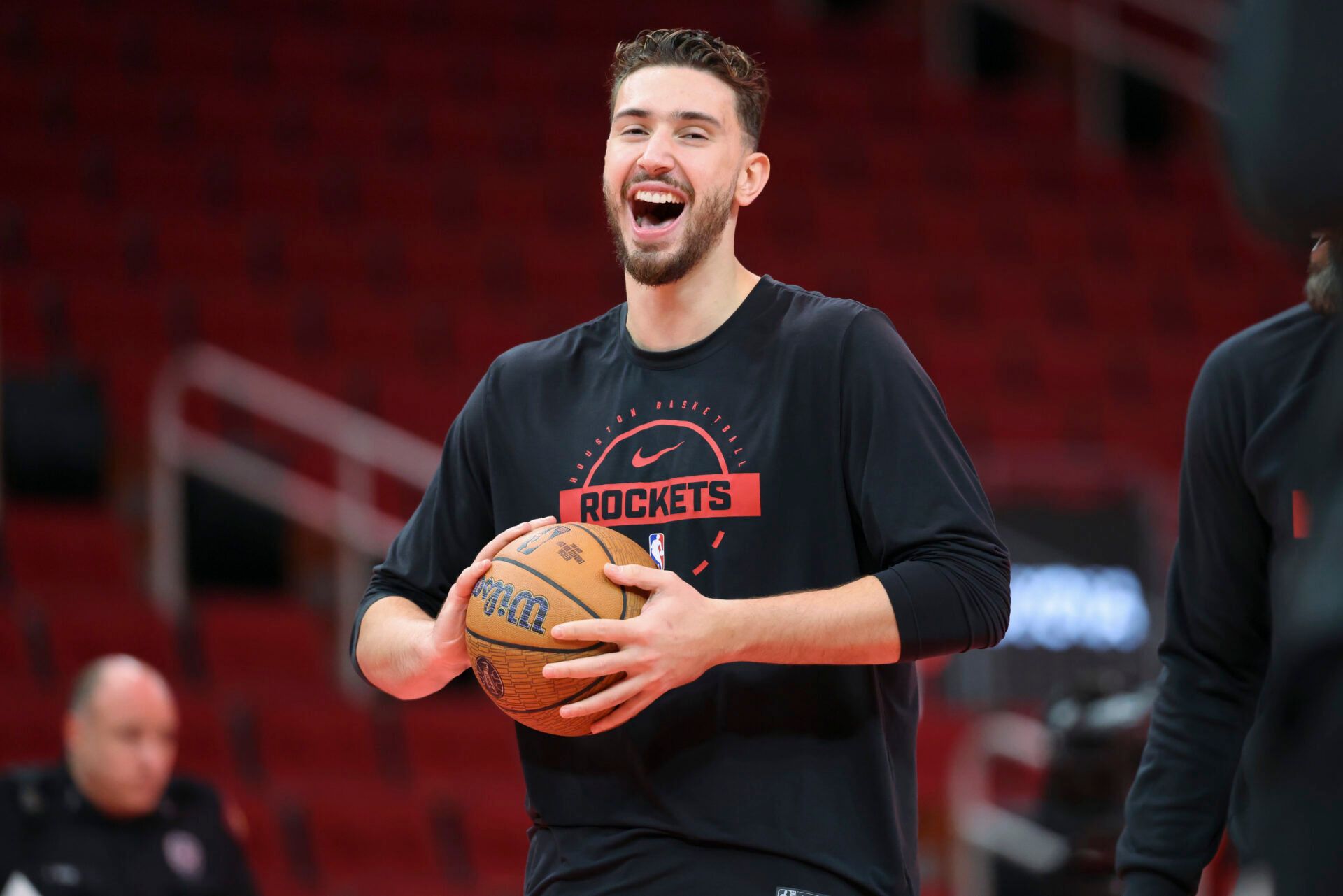 Houston Rockets center Alperen Sengun (28) smiles on the court before the game against the Portland Trail Blazers at Toyota Center.