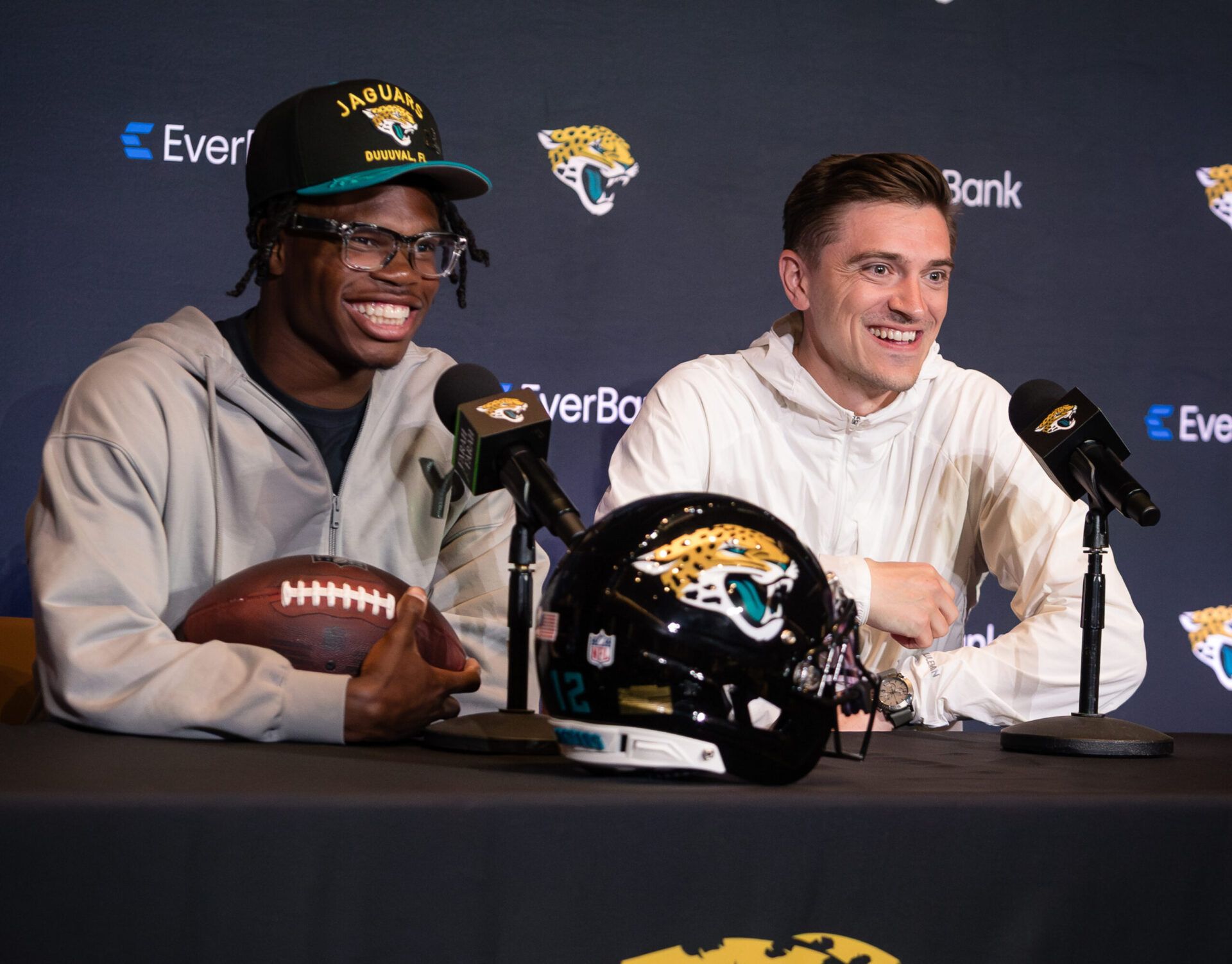 Jacksonville Jaguars first round draft pick Travis Hunter talks to the media beside and general manager James Gladstone during a press conference at Miller Electric Center.