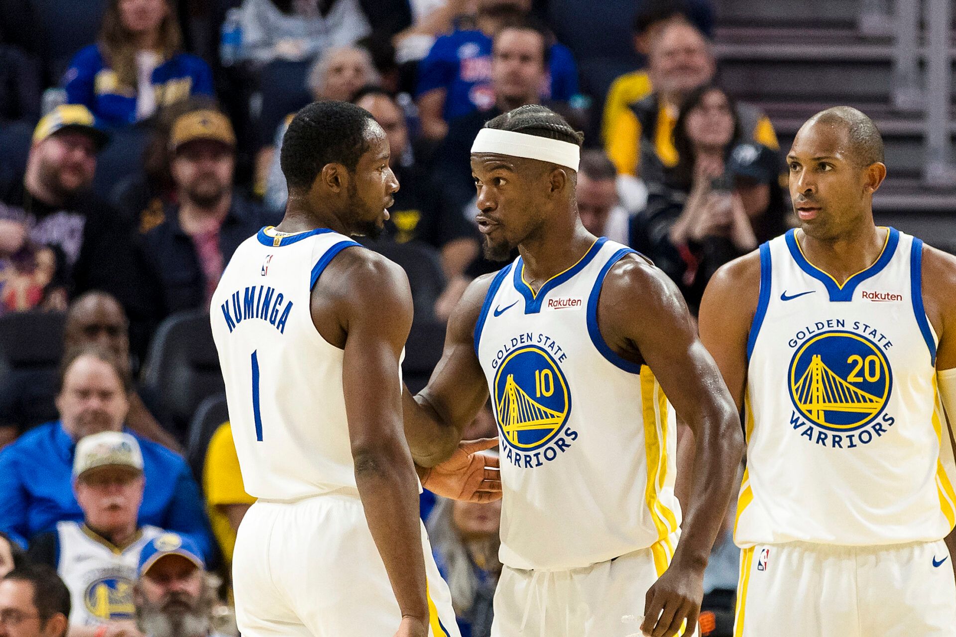 Golden State Warriors forward Jimmy Butler III (10) reacts  towards forward Jonathan Kuminga (1) during the second quarter against the Portland Trail Blazers at Chase Center.