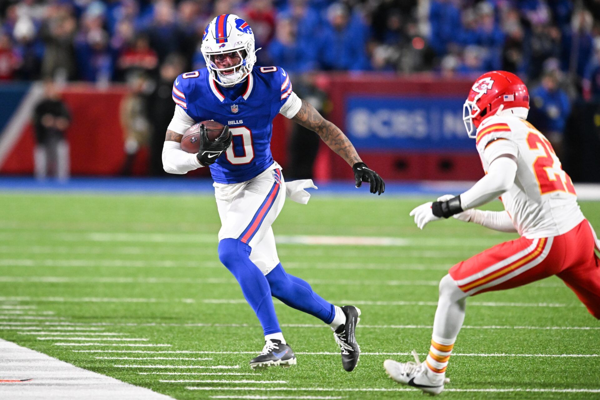 Buffalo Bills wide receiver Keon Coleman (0) runs with the ball in the second half against the Kansas City Chiefs at Highmark Stadium.