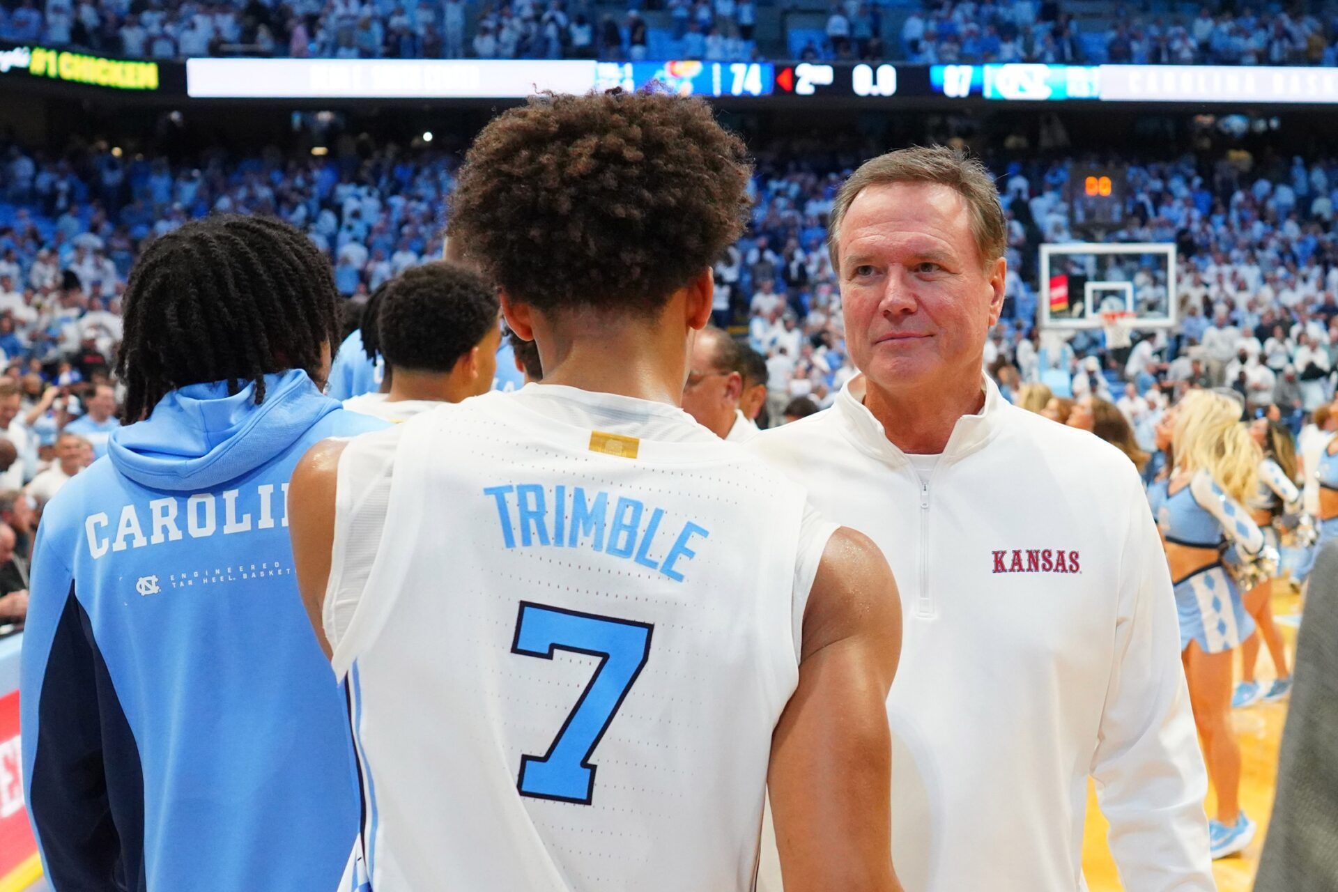 Kansas Jayhawks head coach Bill Self with North Carolina Tar Heels guard Seth Trimble (7) after the game at Dean E. Smith Center.