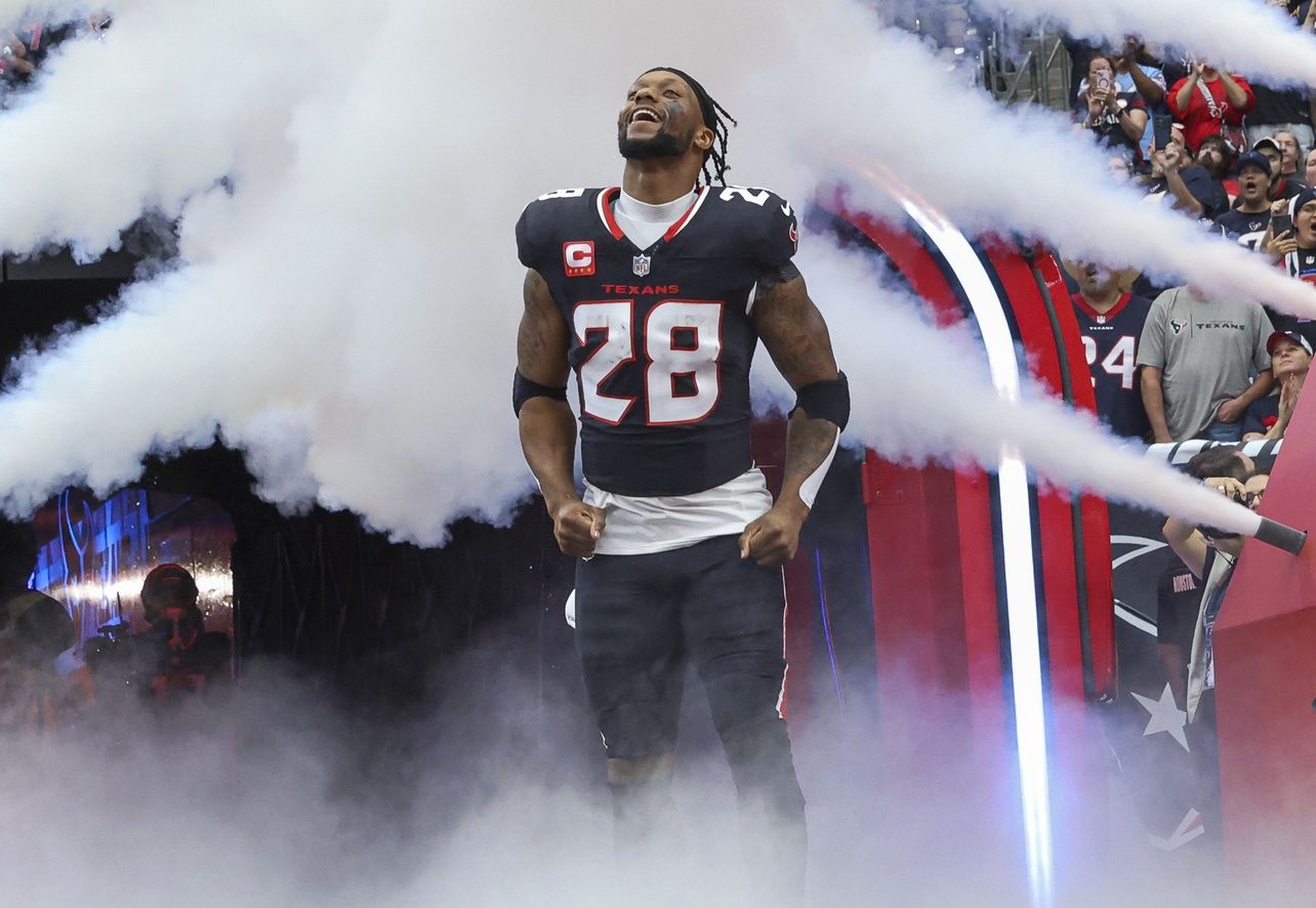 Dec 15, 2024; Houston Texans running back Joe Mixon (28) runs onto the field before the game against the Miami Dolphins at NRG Stadium.