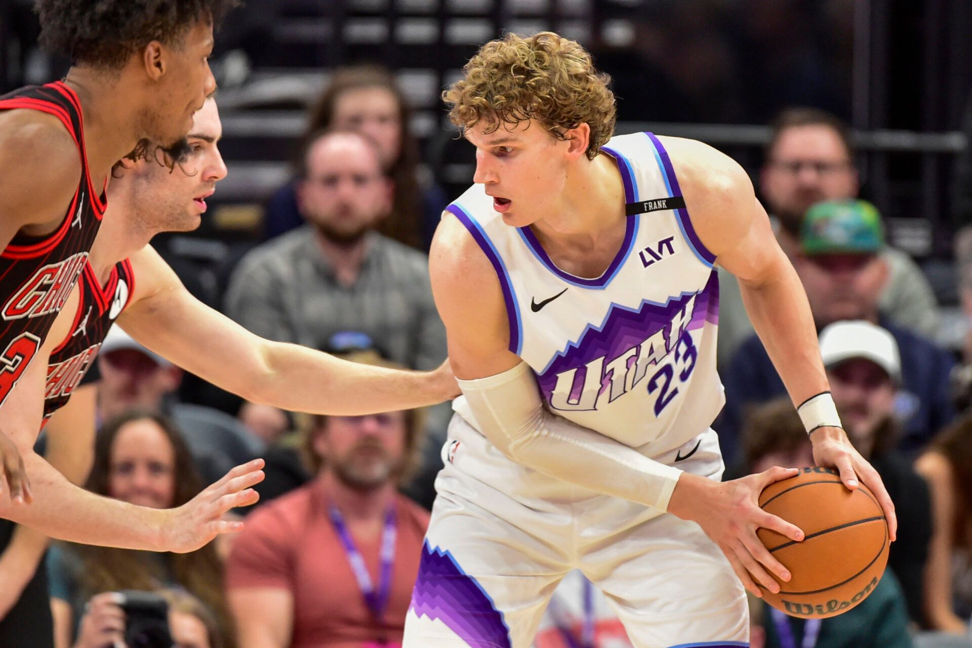 Utah Jazz forward/center Lauri Markkanen (23) prepares his shot against Chicago Bulls guard Josh Giddey (3) during double overtime at Delta Center.