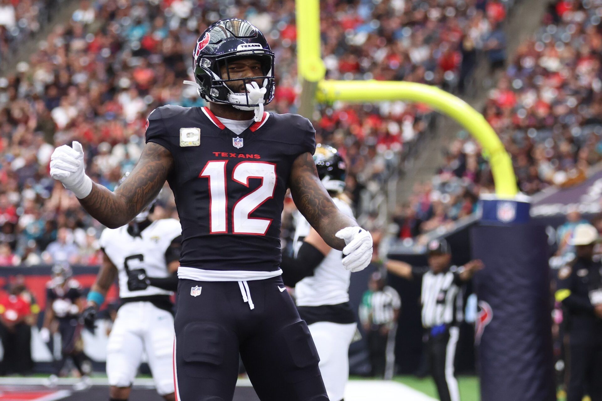 Houston Texans wide receiver Nico Collins (12) reacts after an incomplete pass against the Jacksonville Jaguars during the first half at NRG Stadium.