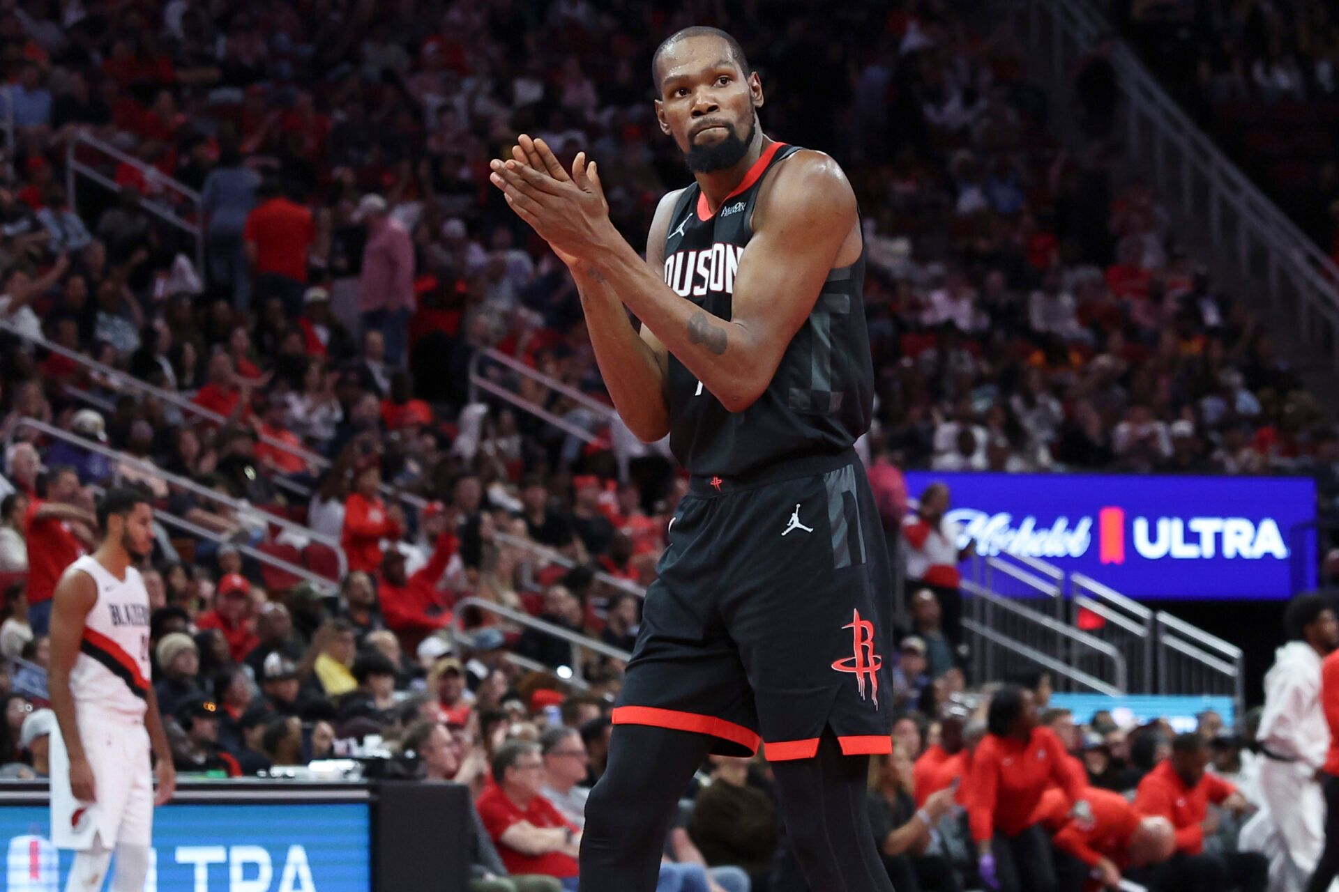 Houston Rockets forward Kevin Durant (7) claps after a play during the fourth quarter against the Portland Trail Blazers at Toyota Center.