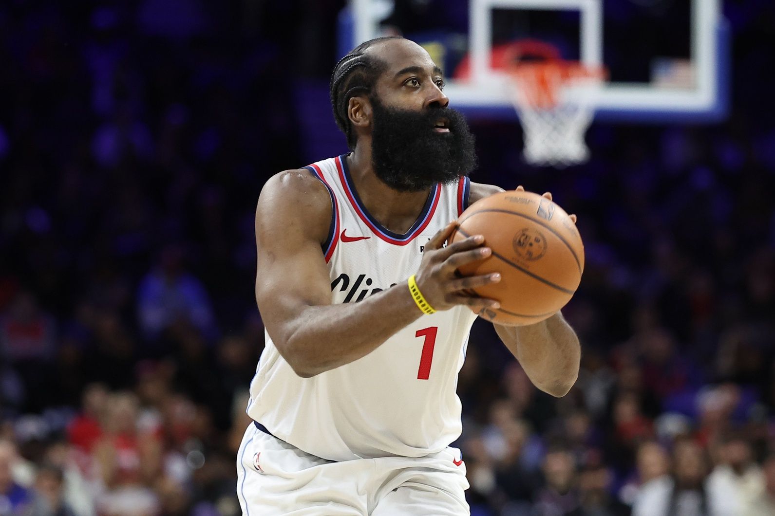 LA Clippers guard James Harden (1) shoots the ball against the Philadelphia 76ers during the fourth quarter at Xfinity Mobile Arena.