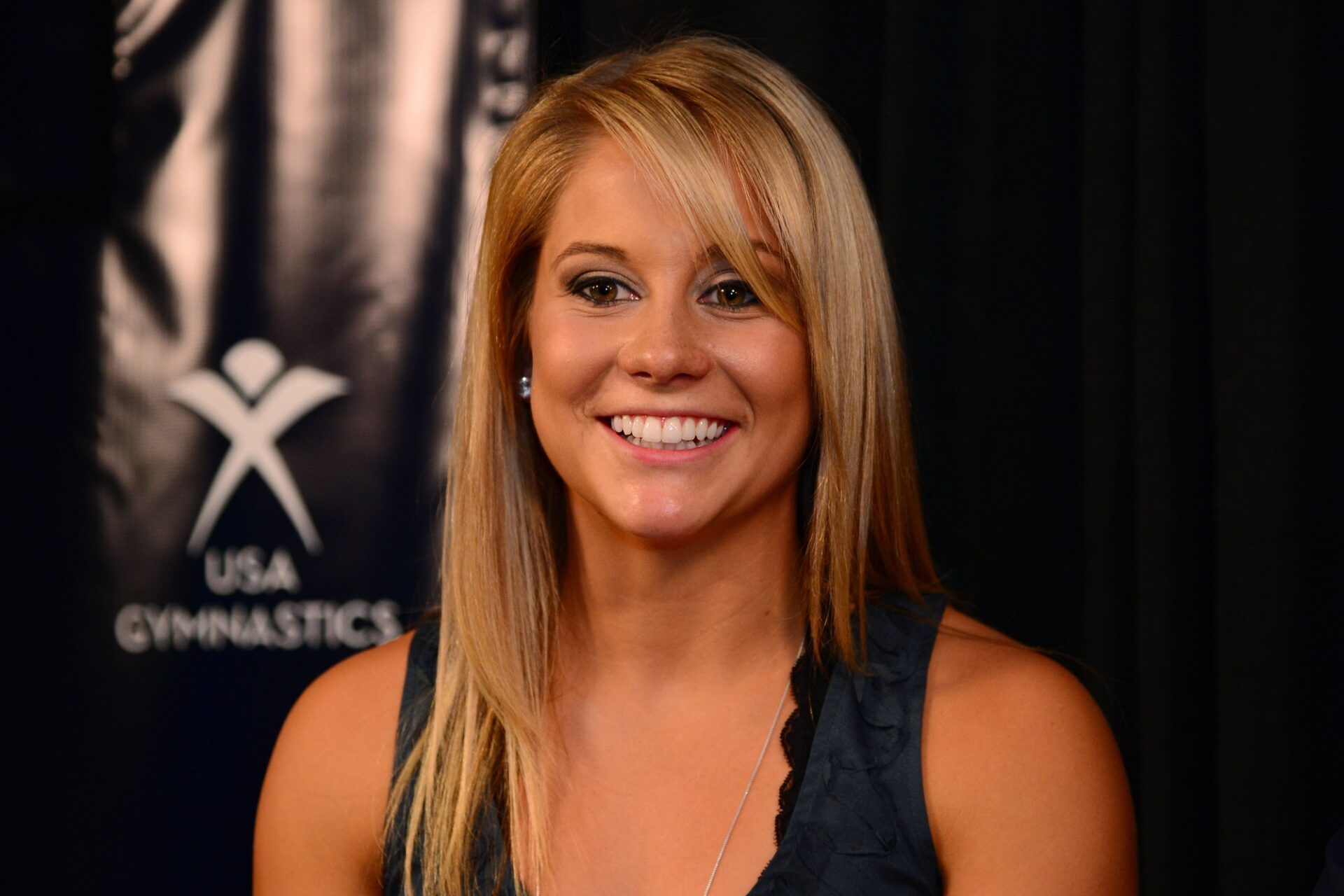 USA Gymnastics olympian Shawn Johnson smiles while addressing the media in a press conference announcement during the 2012 USA Gymnastics Olympic Team Trials at HP Pavilion.