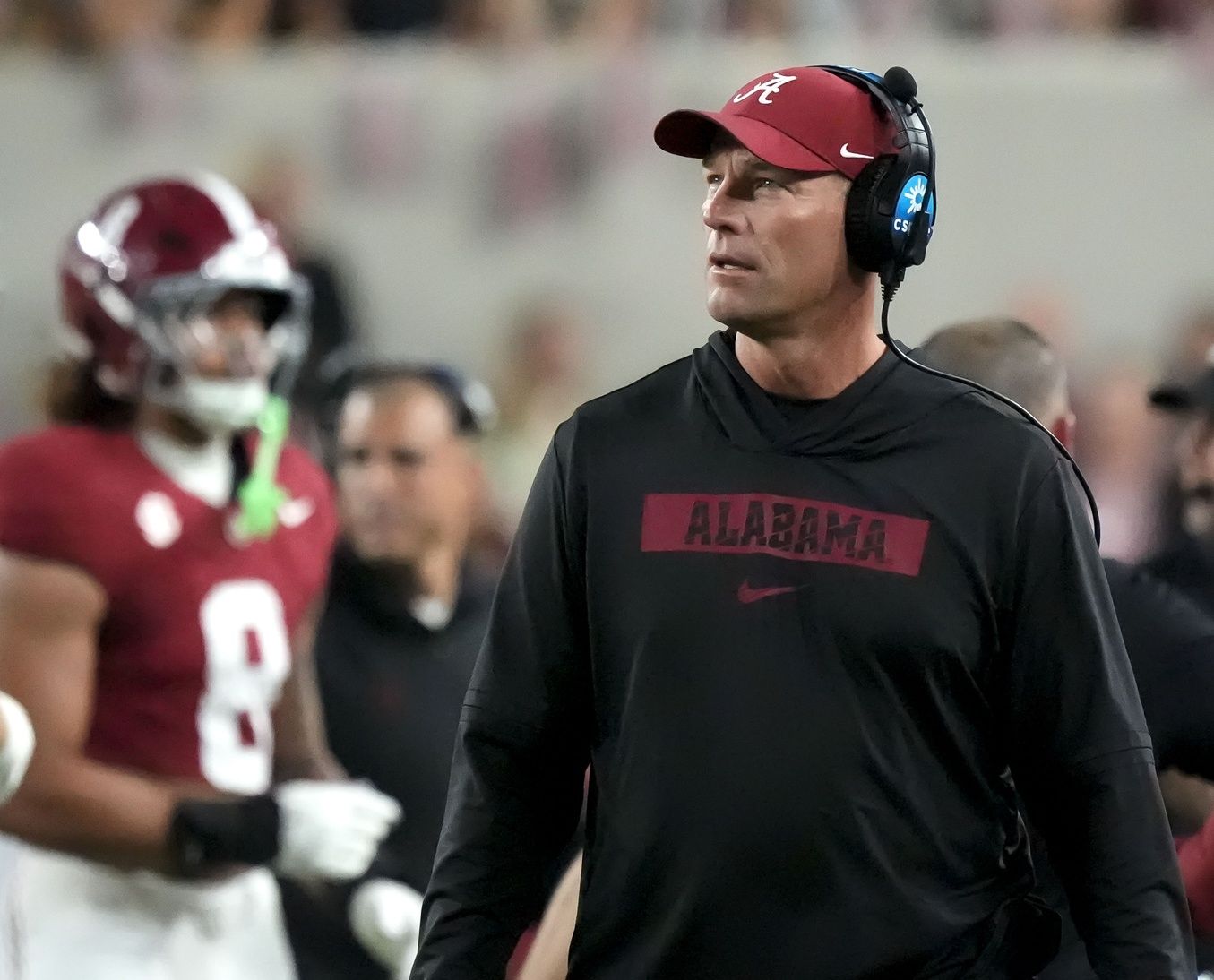 Alabama head coach Kalen DeBoer walks the sidelines in his black hoodie during the game with LSU at Saban Field at Bryant-Denny Stadium.