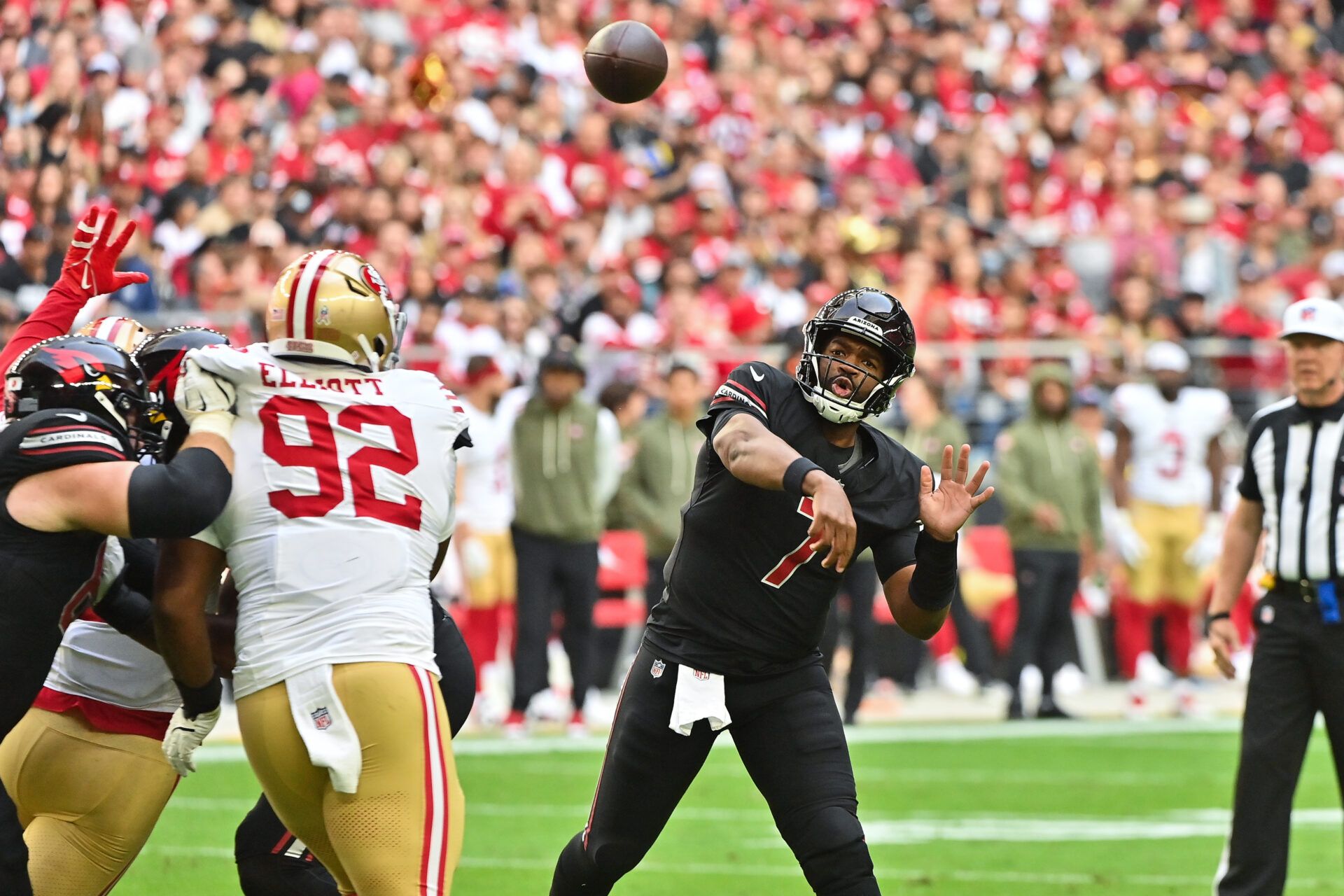 Arizona Cardinals quarterback Jacoby Brissett (7) throws the ball in the first half against the San Francisco 49ers at State Farm Stadium.