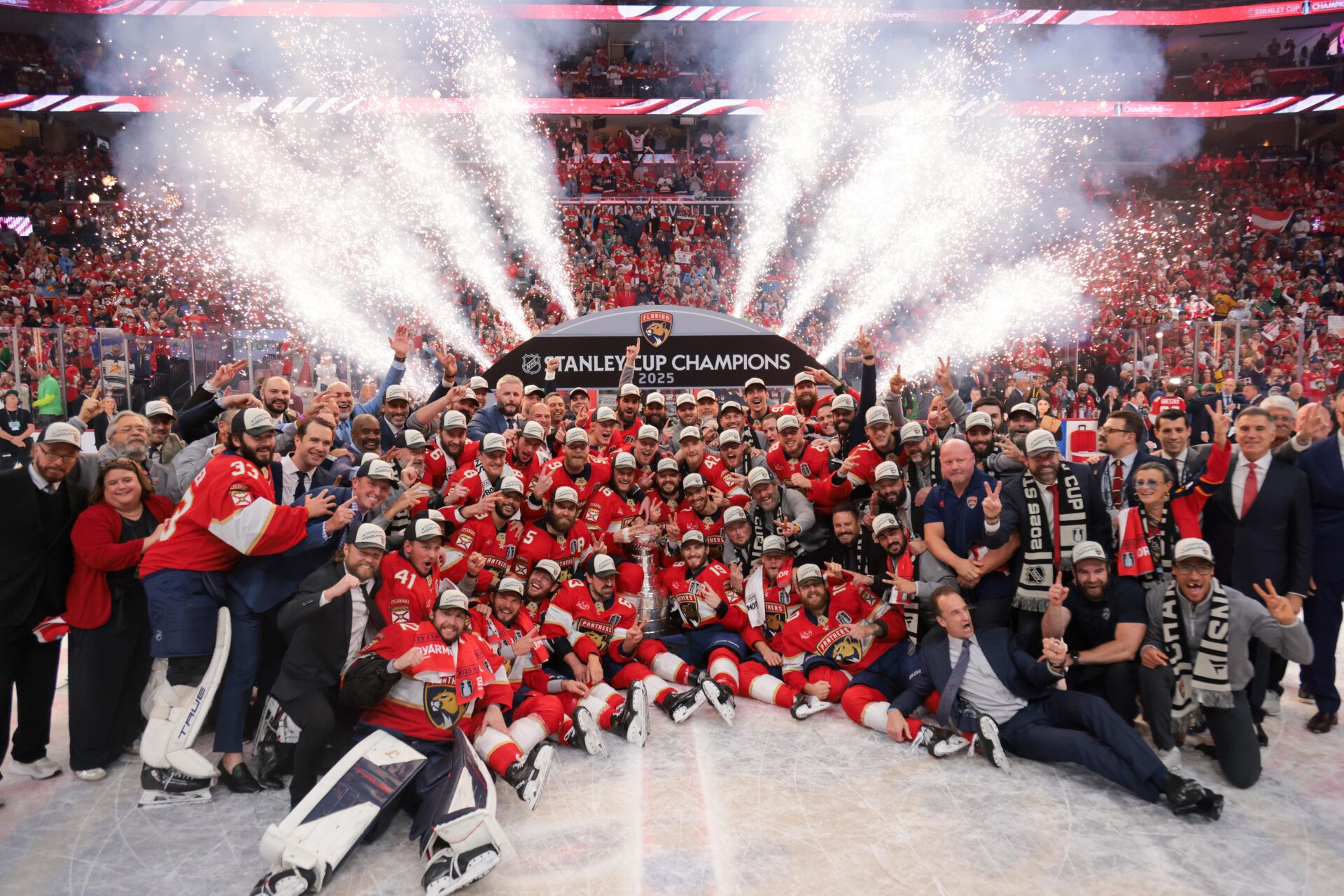 The Florida Panthers pose for a photo with the Stanley Cup after winning game six of the 2025 Stanley Cup Final against the Edmonton Oilers at Amerant Bank Arena.
