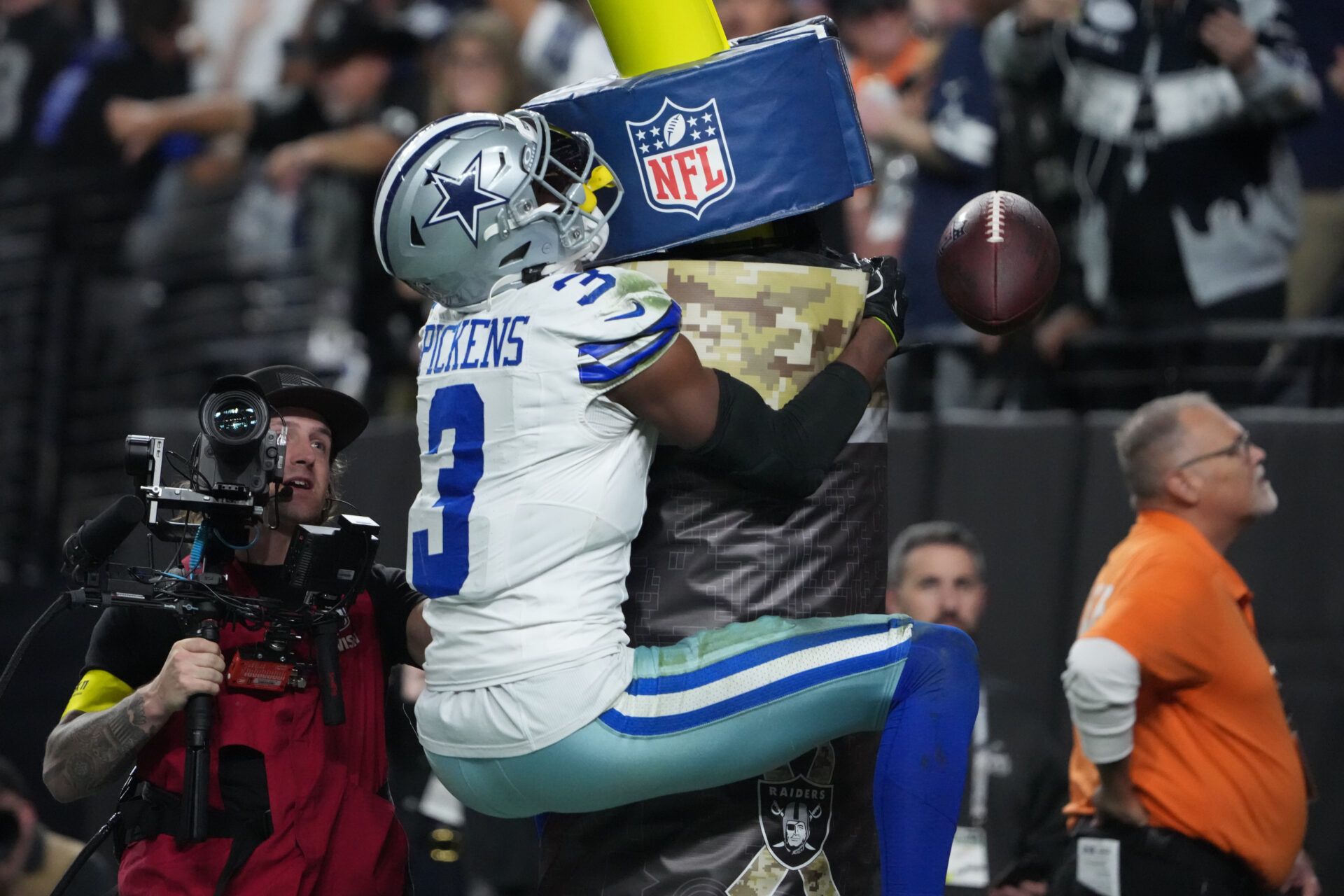 Dallas Cowboys wide receiver George Pickens (3) reacts after scoring a touchdown against the Las Vegas Raiders during the first half at Allegiant Stadium.