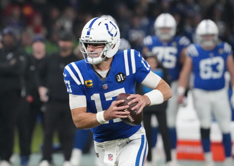 Indianapolis Colts quarterback Daniel Jones (17) runs the ball against the Atlanta Falcons during the NFL Berlin Game at Olympic Stadium.