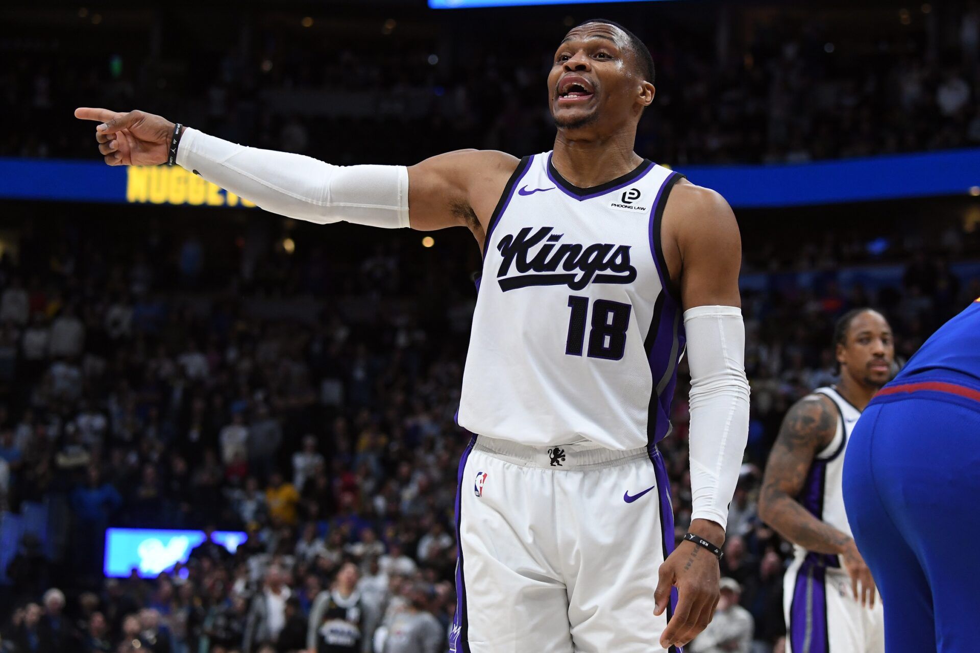 Sacramento Kings guard Russell Westbrook (18) talks to the Denver Nuggets bench in the closing seconds of a Kings win at Ball Arena.