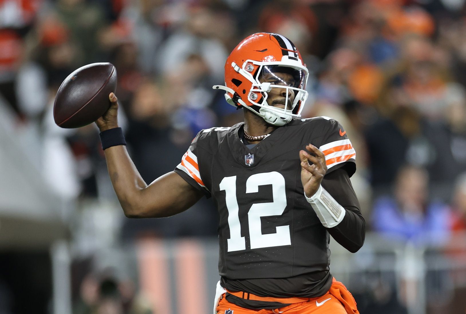Cleveland Browns quarterback Shedeur Sanders (12) throws downfield during the fourth quarter against the Baltimore Ravens at Huntington Bank Field.