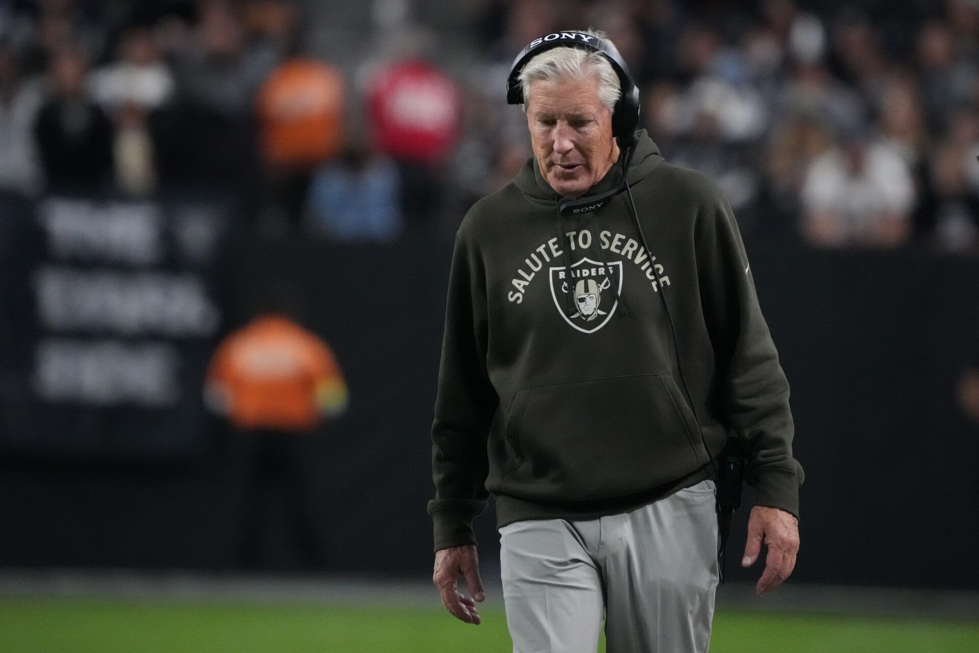 Las Vegas Raiders head coach Pete Carroll walks the sidelines against the Dallas Cowboys during the first half at Allegiant Stadium.