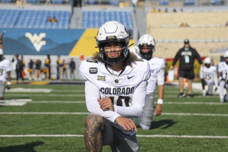Colorado Buffaloes quarterback Julian Lewis (10) warms up prior to their game against the West Virginia Mountaineers at Milan Puskar Stadium.