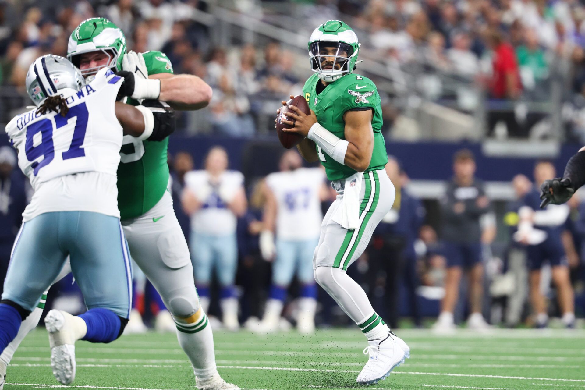 Philadelphia Eagles quarterback Jalen Hurts (1) looks to pass in the first quarter against the Dallas Cowboys at AT&T Stadium.
