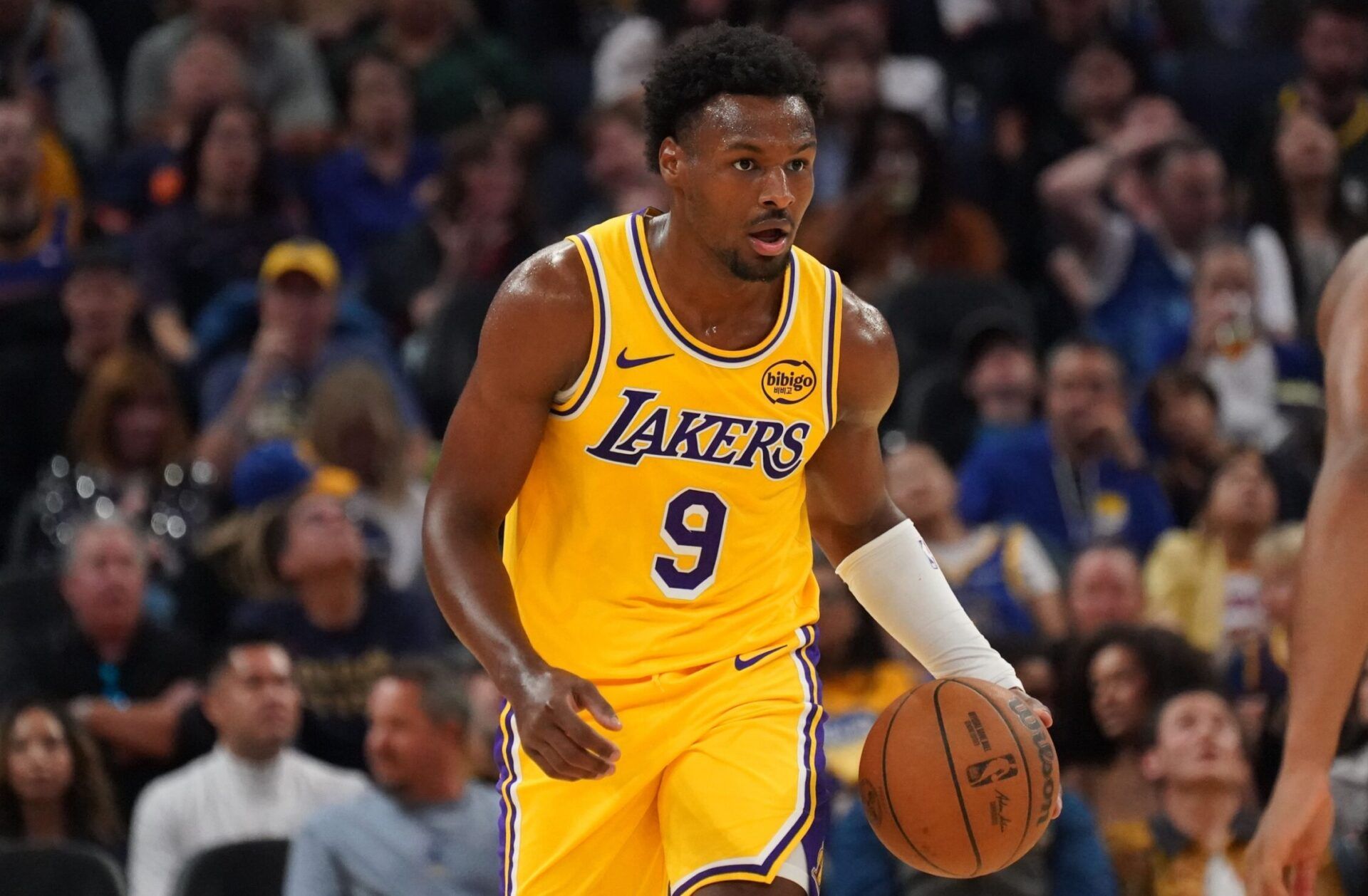 Los Angeles Lakers guard Bronny James (9) dribbles upcourt against the Golden State Warriors in the second quarter at Chase Center.