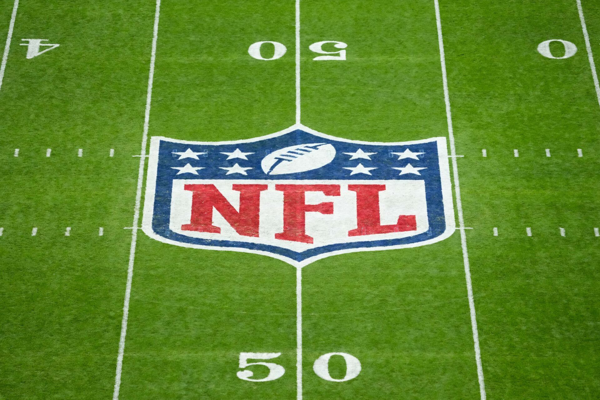 The NFL logo at midfield is seen prior to the 2025 NFL Madrid Game between the Miami Dolphins and the Washington Commanders at Santiago Bernabeu Stadium.