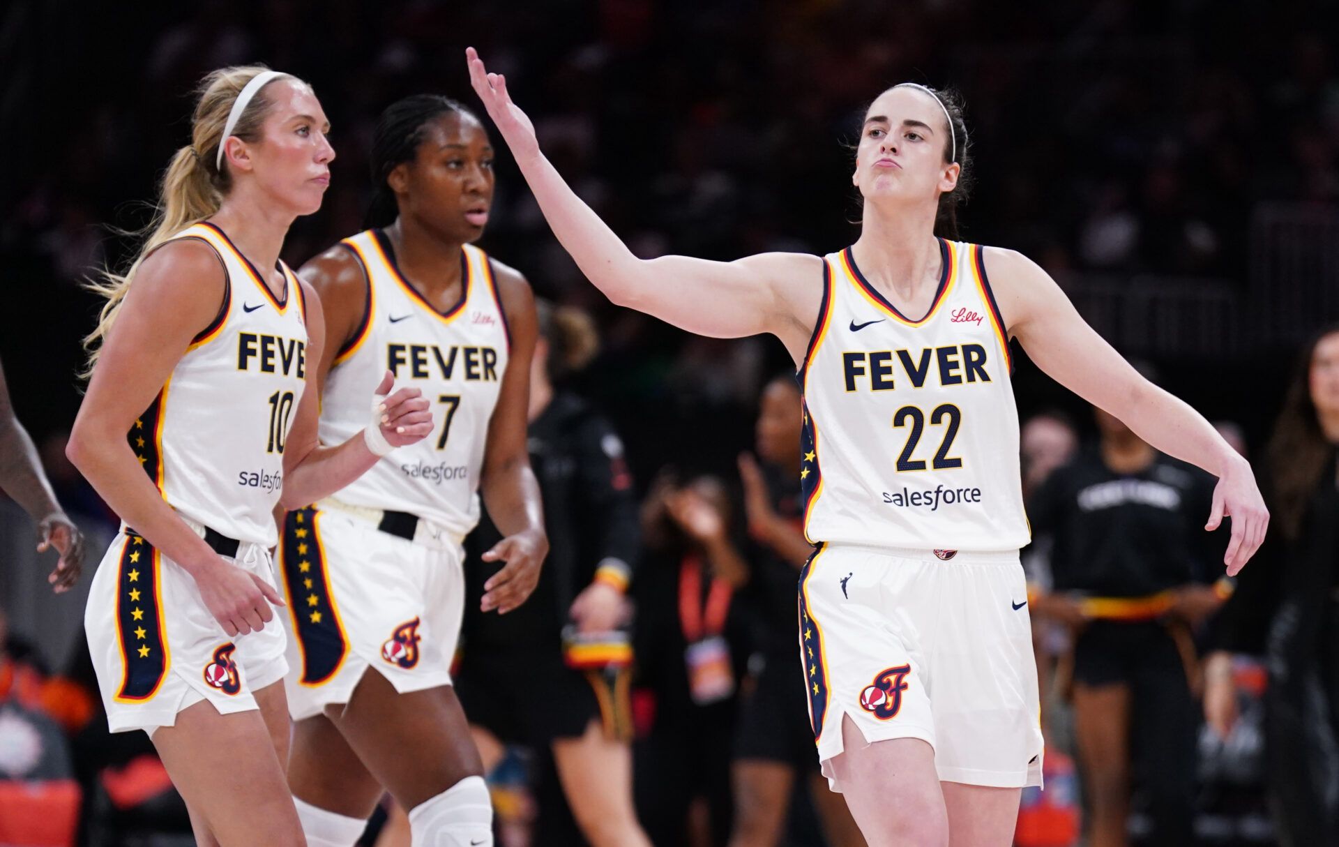 Indiana Fever guard Caitlin Clark (22) reacts to the crowd as they take on the Connecticut Sun in the first quarter at TD Garden.
