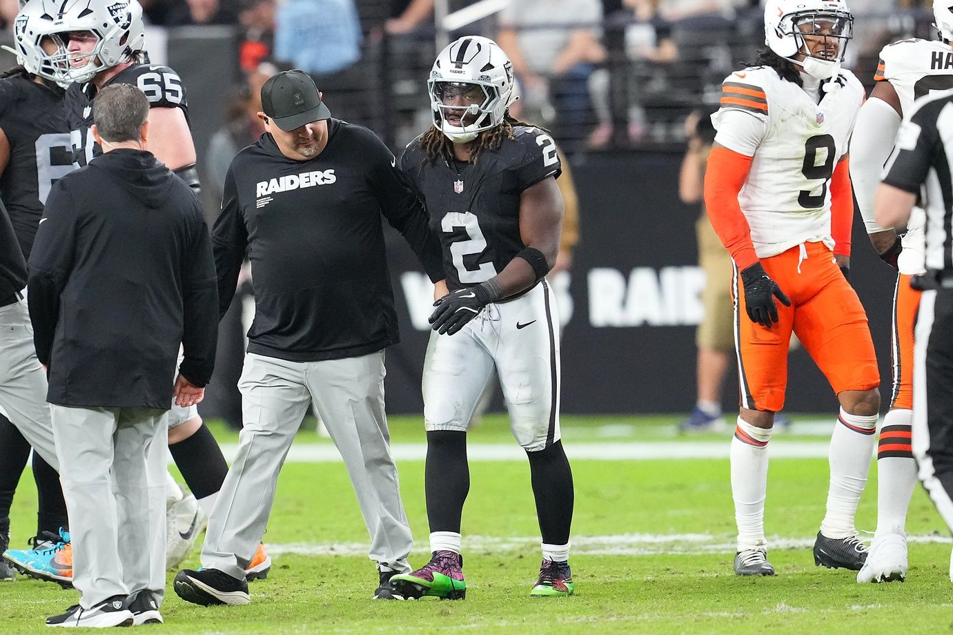 Las Vegas Raiders running back Ashton Jeanty (2) walks slowly off the field after sustaining a possible injury against the Cleveland Browns during the fourth quarter at Allegiant Stadium.