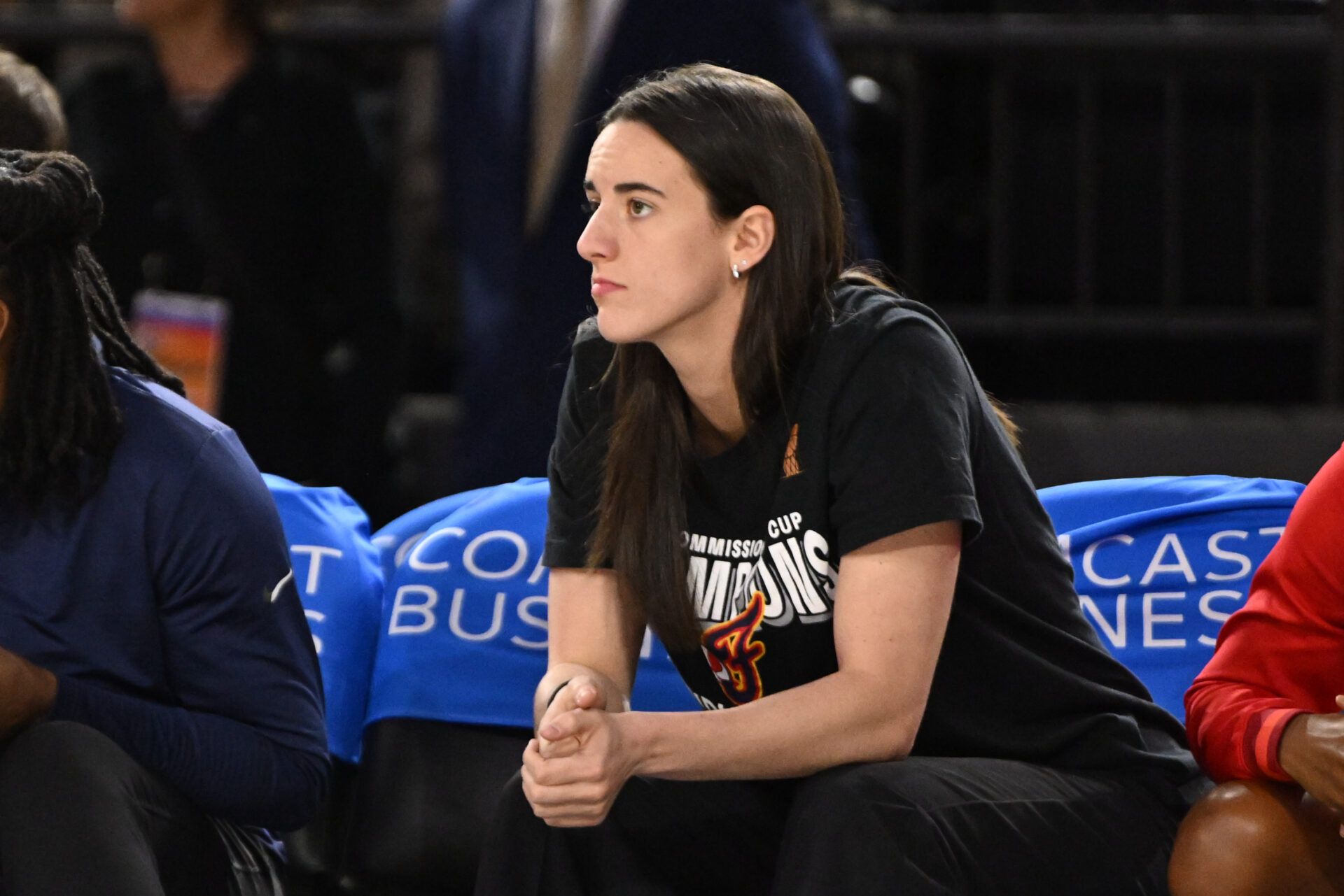 Indiana Fever guard Caitlin Clark (22) looks on from the bench against the Washington Mystics during the first quarter at CFG Bank Arena.
