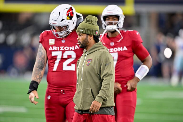 Arizona Cardinals quarterback Kyler Murray (1) walks on the field before the game between the Dallas Cowboys and the Arizona Cardinals at AT&T Stadium.