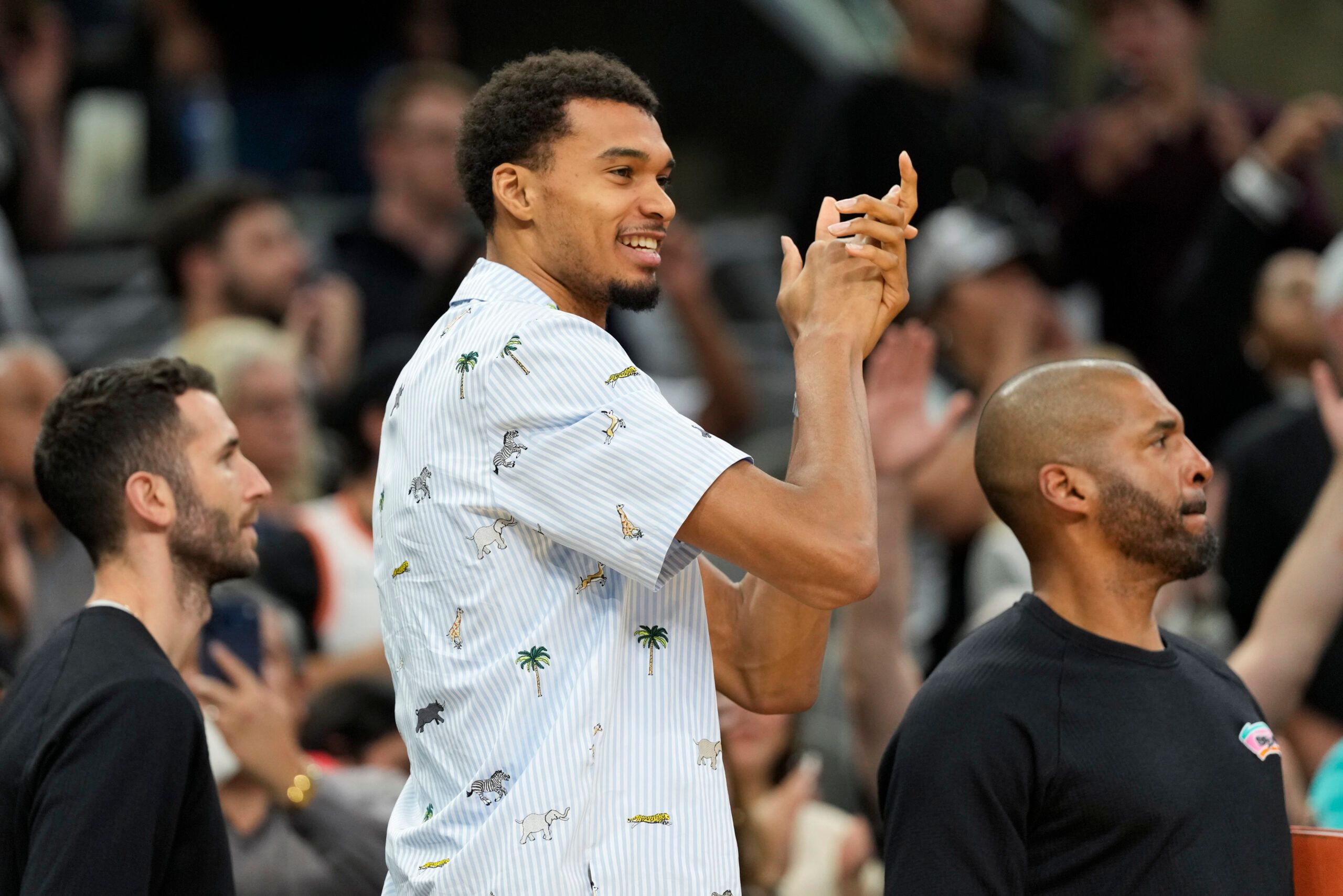 San Antonio Spurs forward Victor Wembanyama (1) reacts from the bench after a victory the Atlanta Hawks at Frost Bank Center.