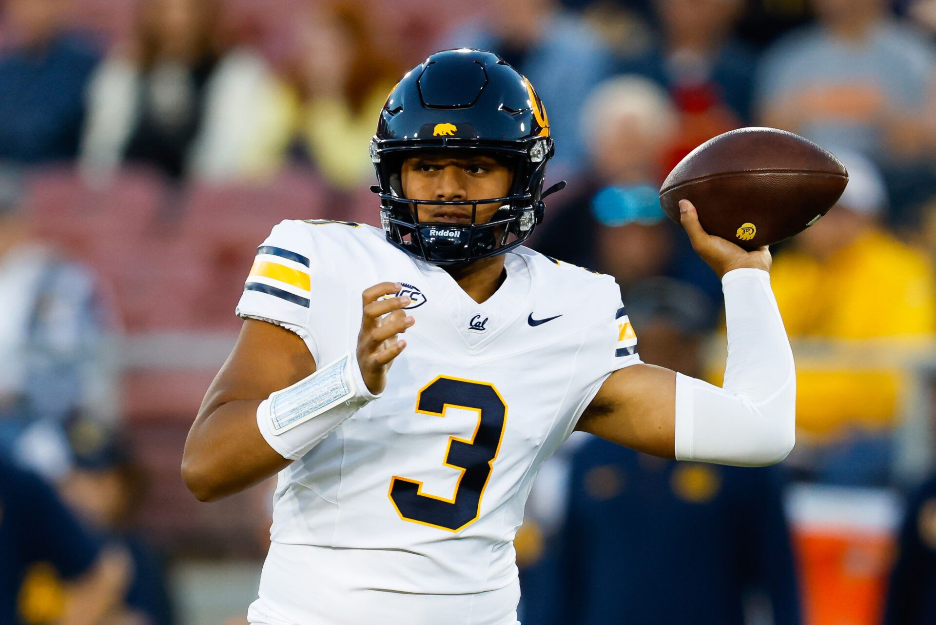 California Golden Bears quarterback Jaron-Keawe Sagapolutele (3) drops back to pass the ball during the first quarter against the Stanford Cardinal at Stanford Stadium.