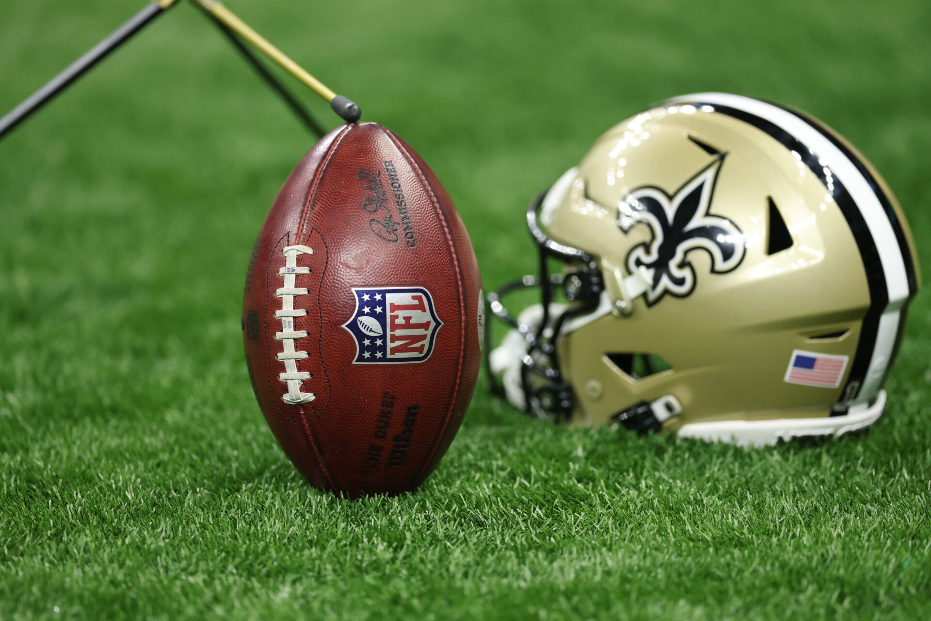 The NFL logo is seen on a ball during the second half of a game between the New Orleans Saints and New England Patriots at Caesars Superdome.
