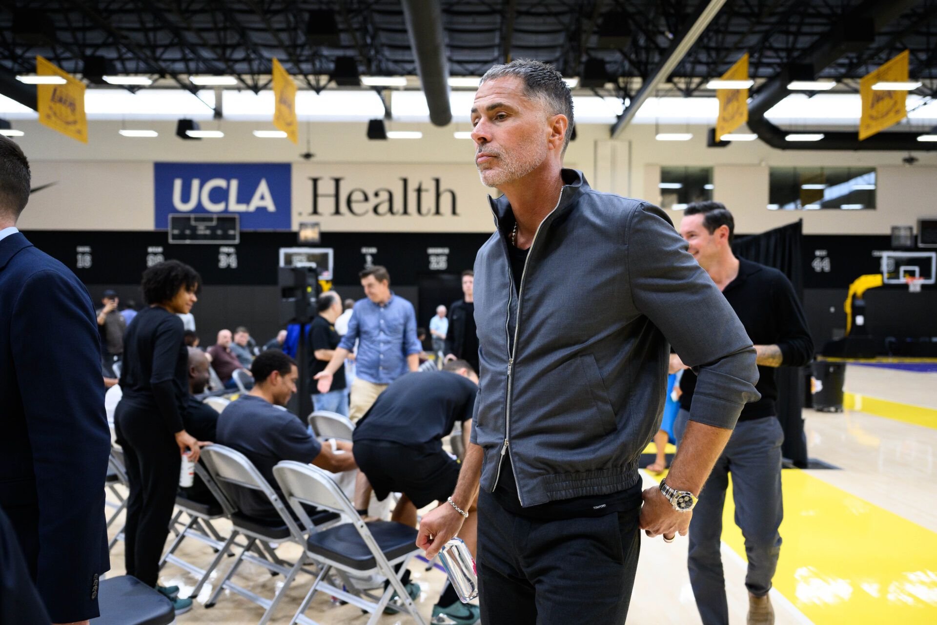 Los Angeles Lakers general manager Rob Pelinka leaves a press conference to preview the 2025-26 season at UCLA Health Training Center.