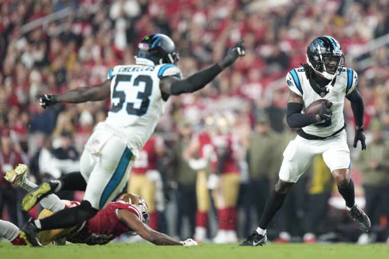 Carolina Panthers cornerback Jaycee Horn (8) catches an interception against the San Francisco 49ers during the first half at Levi's Stadium.