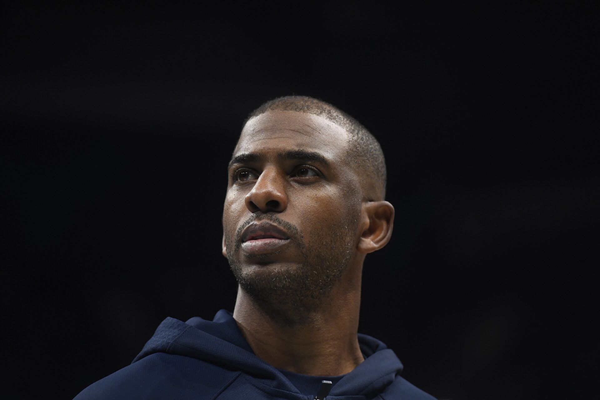 Los Angeles Clippers guard Chris Paul (3) in a time out during the first half against the Charlotte Hornets at the Spectrum Center.