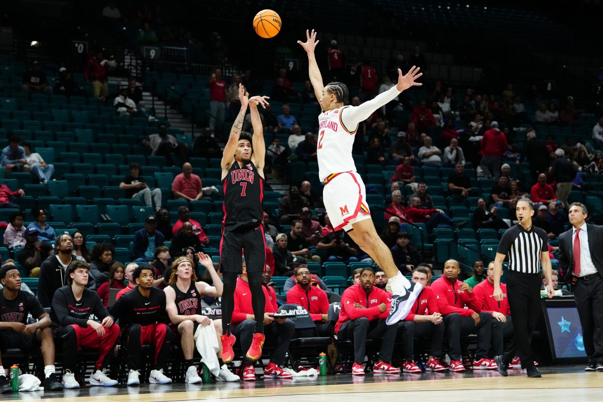 UNLV Rebels guard Al Green (7) shoots against Maryland Terrapins guard Myles Rice (2) during the second half in a 2025 Players Era Festival group play game at MGM Grand Garden Arena.