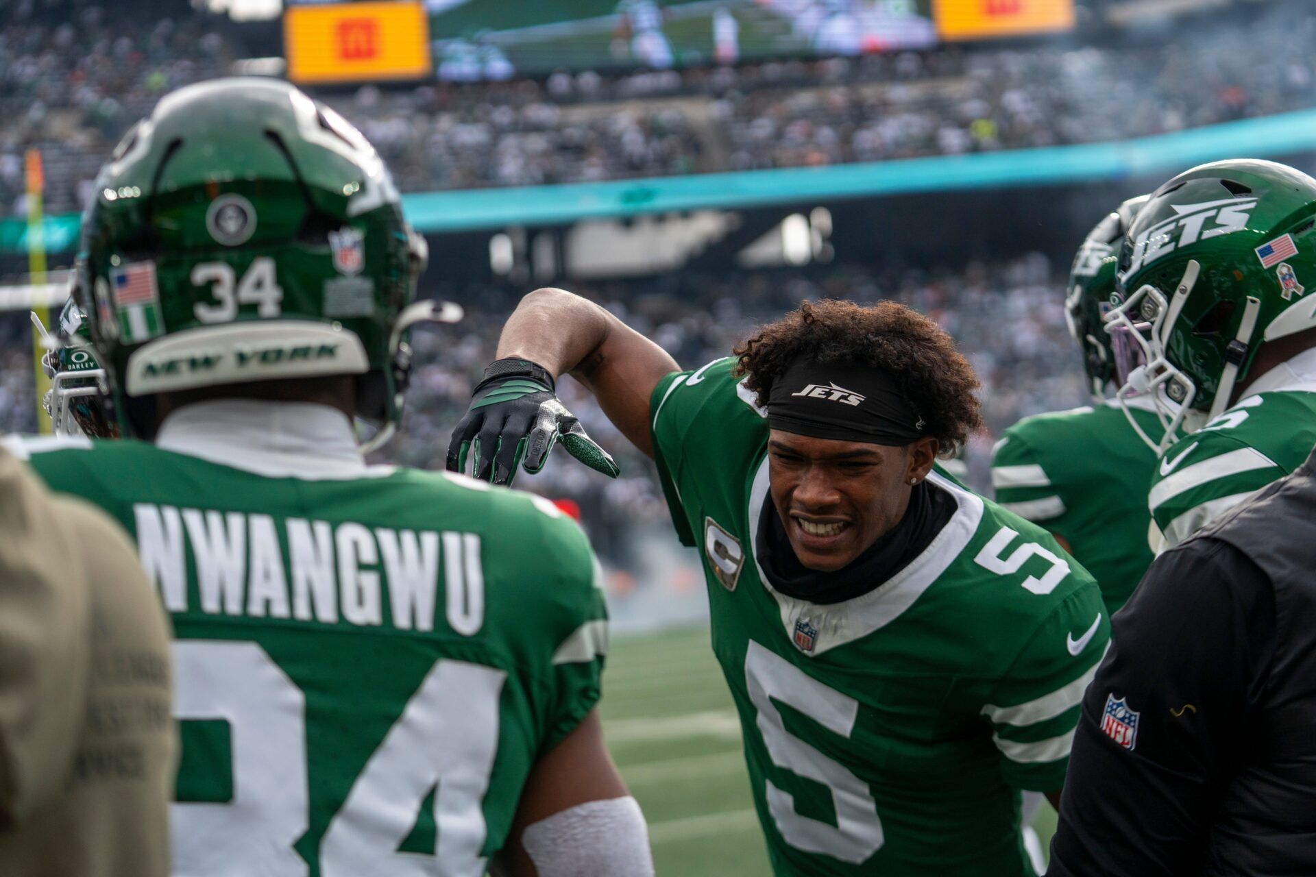 New York Jets wide receiver Garrett Wilson (5) celebrates with New York Jets running back Kene Nwangwu (34) after Nwangwu scores a touchdown during an NFL Week 10 game between the New York Jets and the Cleveland Browns at MetLife Stadium on Sunday, Nov. 9, 2025.