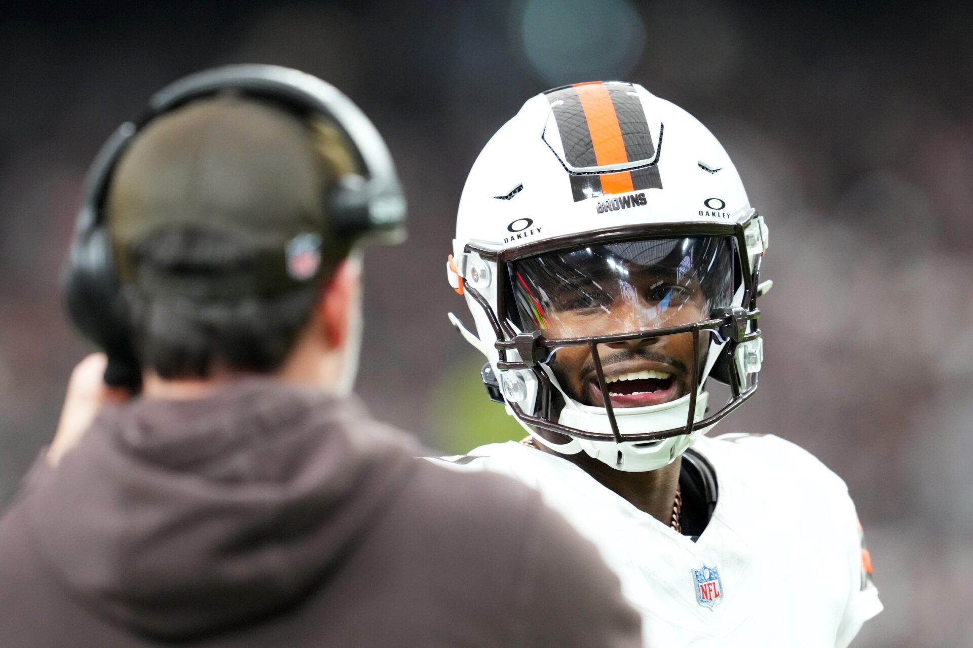Cleveland Browns quarterback Shedeur Sanders (12) talks to head coach Kevin Stefanski in the first half against the Las Vegas Raiders  at Allegiant Stadium.