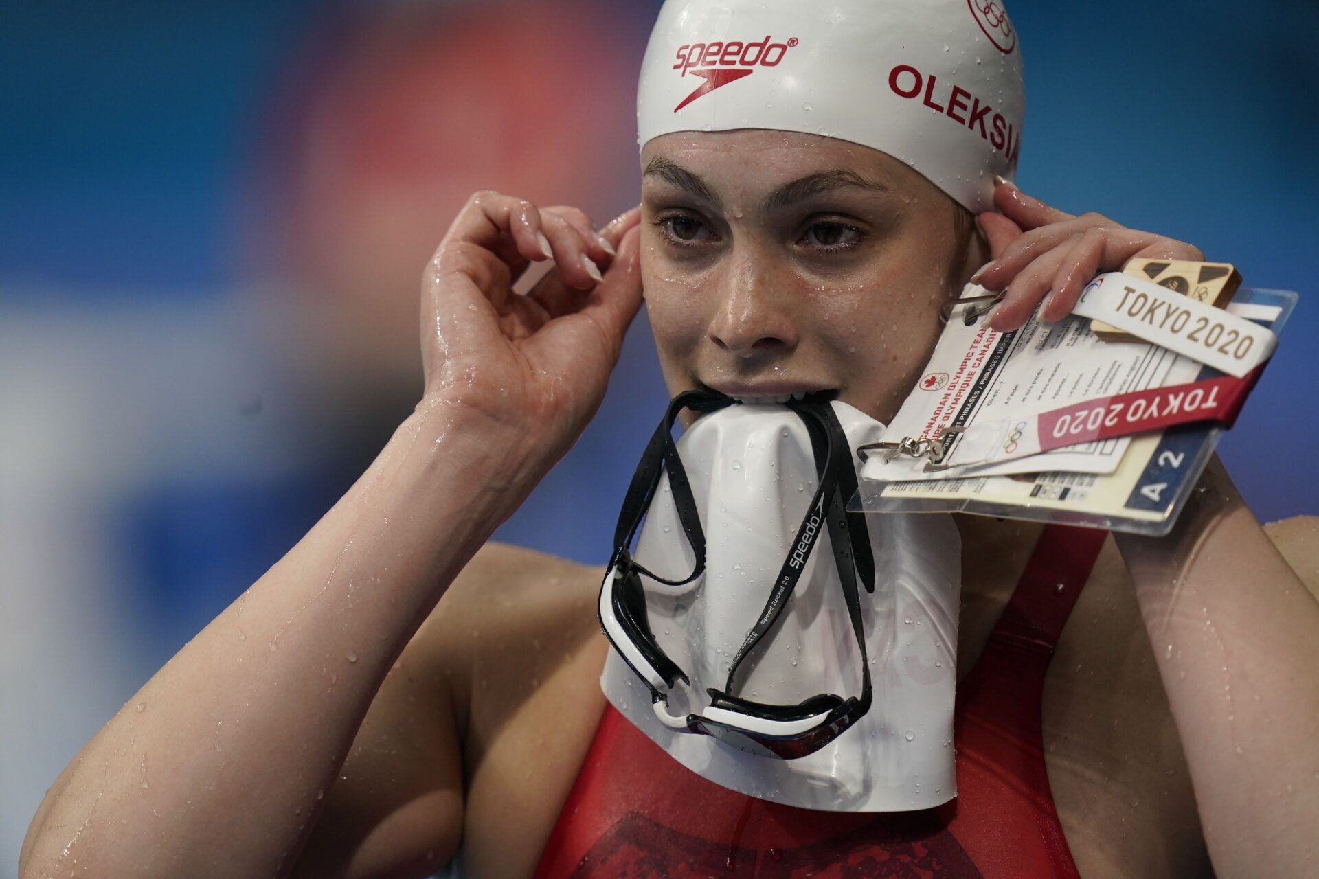 Penny Oleksiak (CAN) walks out of the pool after the women's 100m freestyle heats during the Tokyo 2020 Olympic Summer Games at Tokyo Aquatics Centre.