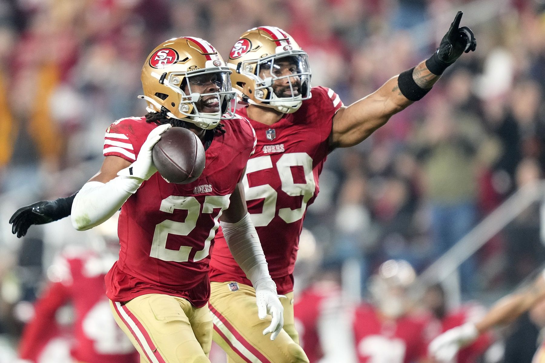 San Francisco 49ers safety Ji'Ayir Brown (27) reacts after an interception against the Carolina Panthers during the first half at Levi's Stadium.