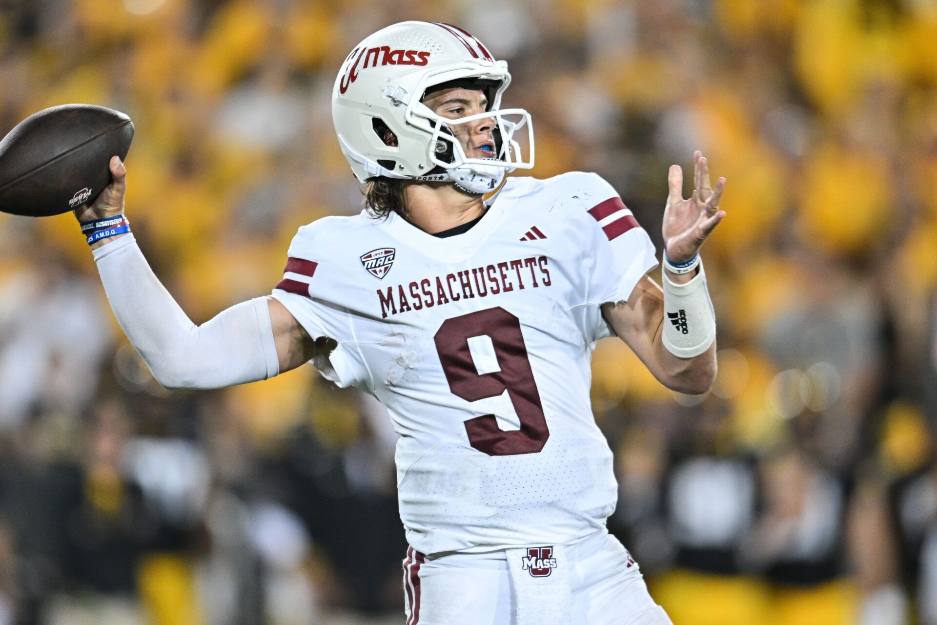 Massachusetts Minutemen quarterback Grant Jordan (9) throws a pass against the Iowa Hawkeyes during the third quarter at Kinnick Stadium.