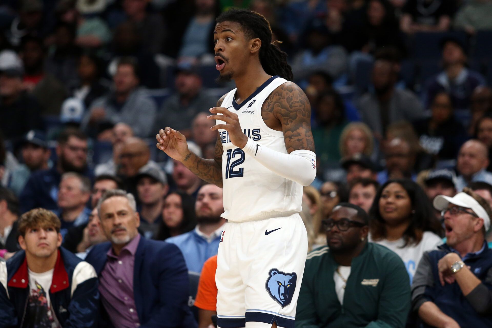 Memphis Grizzlies guard Ja Morant (12) reacts during the third quarter against the Houston Rockets at FedExForum.