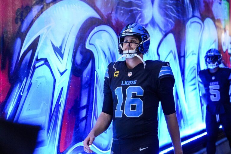 Detroit Lions quarterback Jared Goff (16) walks down the tunnel for warmup ahead of the New York Giants game at Ford Field in Detroit on Sunday, Nov. 23, 2025.