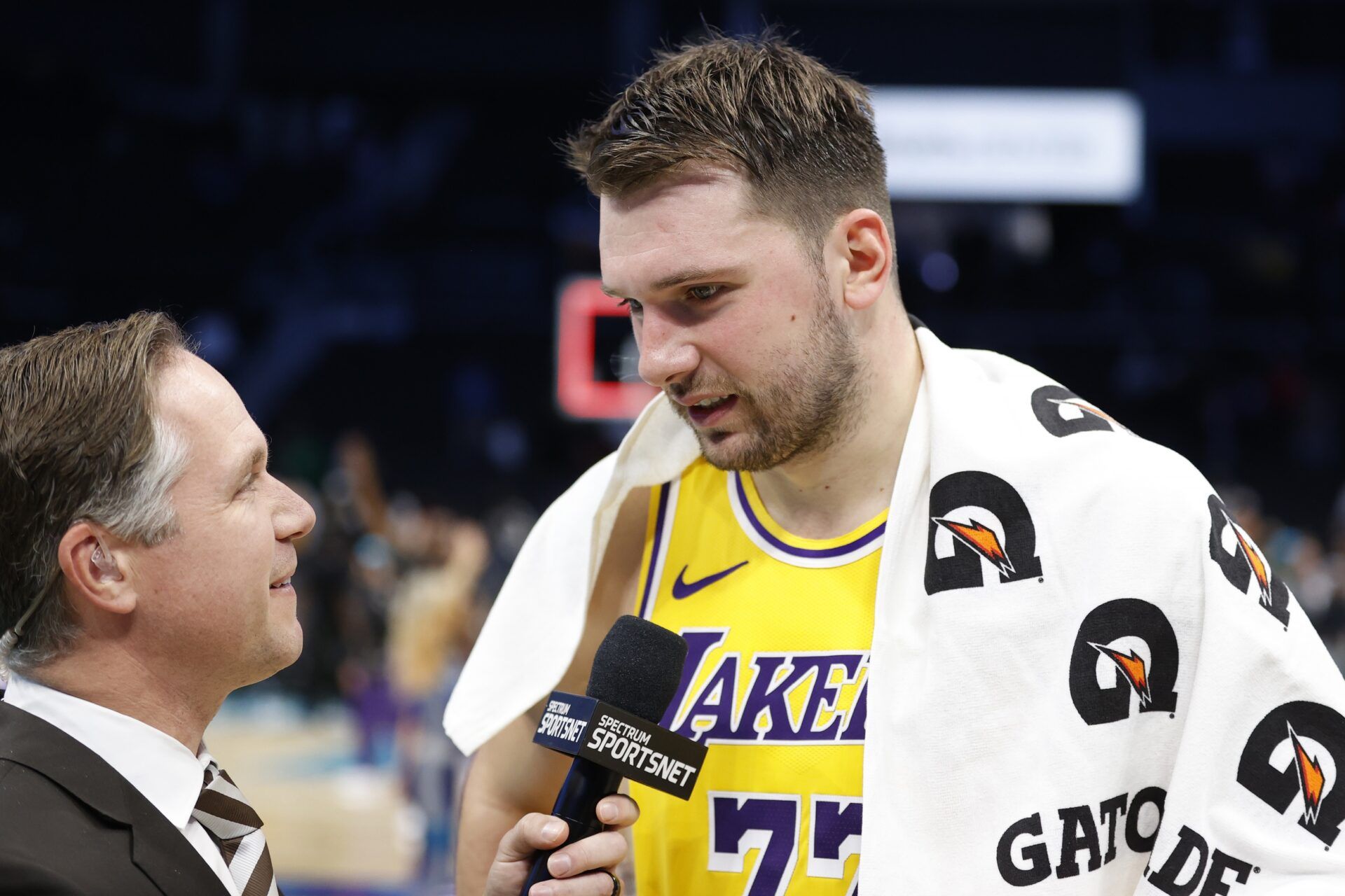 Los Angeles Lakers forward/guard Luka Doncic (77) is interviewed following the game against the Charlotte Hornets at Spectrum Center.