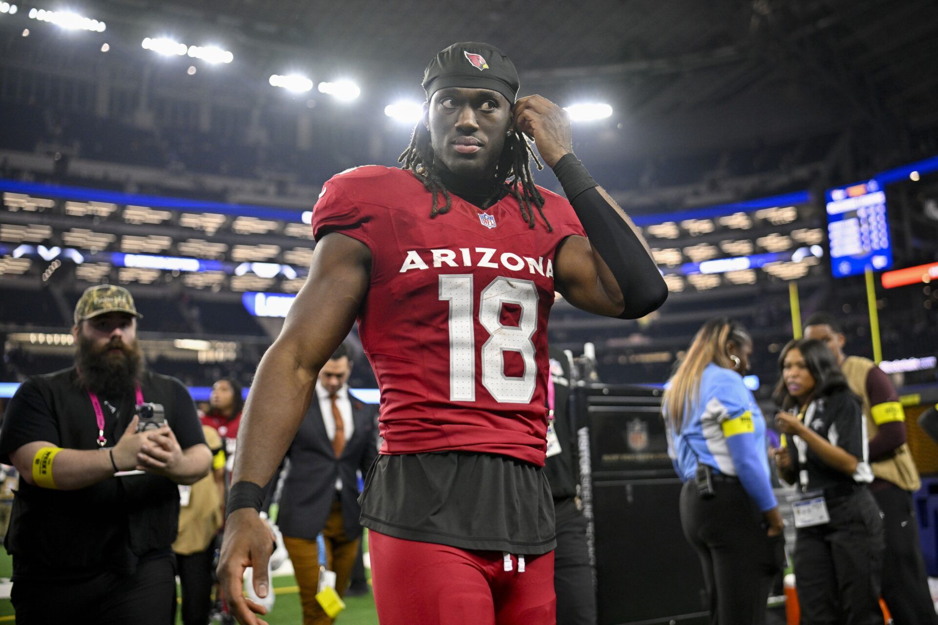 Arizona Cardinals wide receiver Marvin Harrison Jr. (18) walks off the field after the game between the Dallas Cowboys and the Arizona Cardinals at AT&T Stadium.